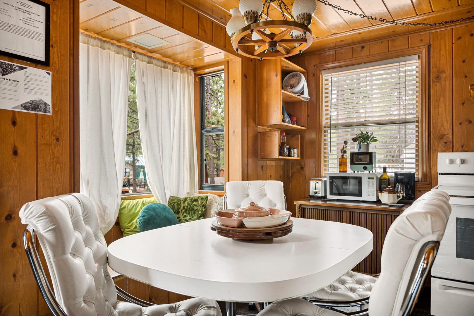 Dining area with table and seating for 4-6