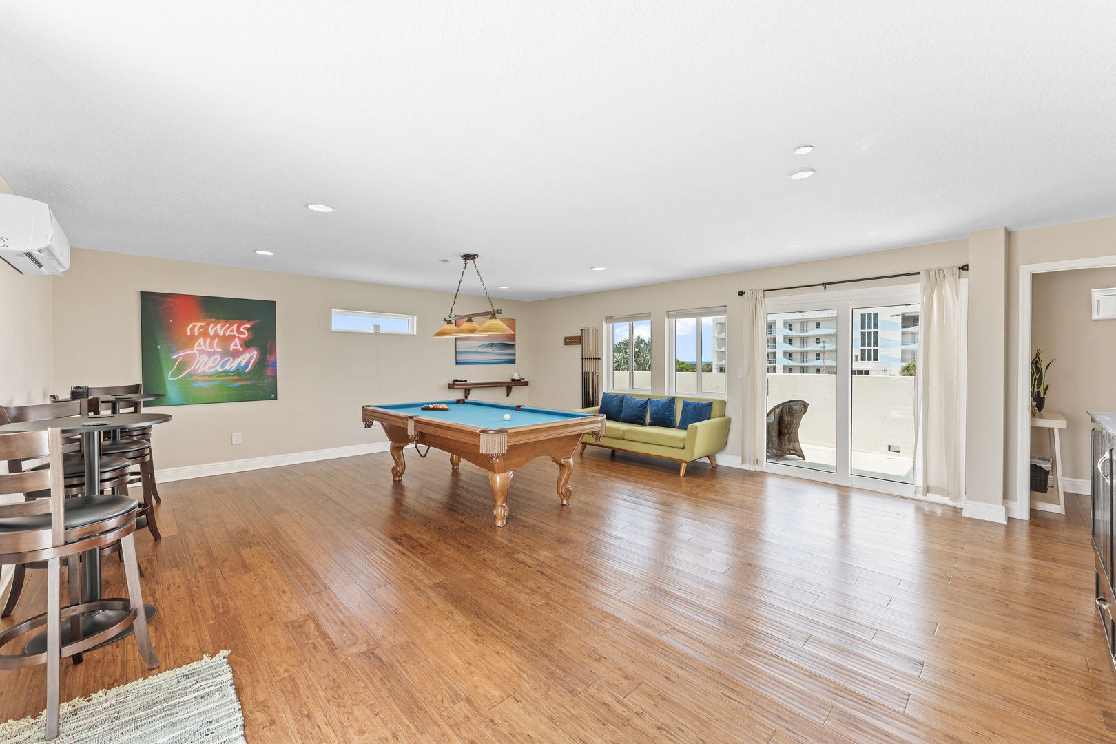 Game room with pool table, Smart TV, murphy bed, and dual decks