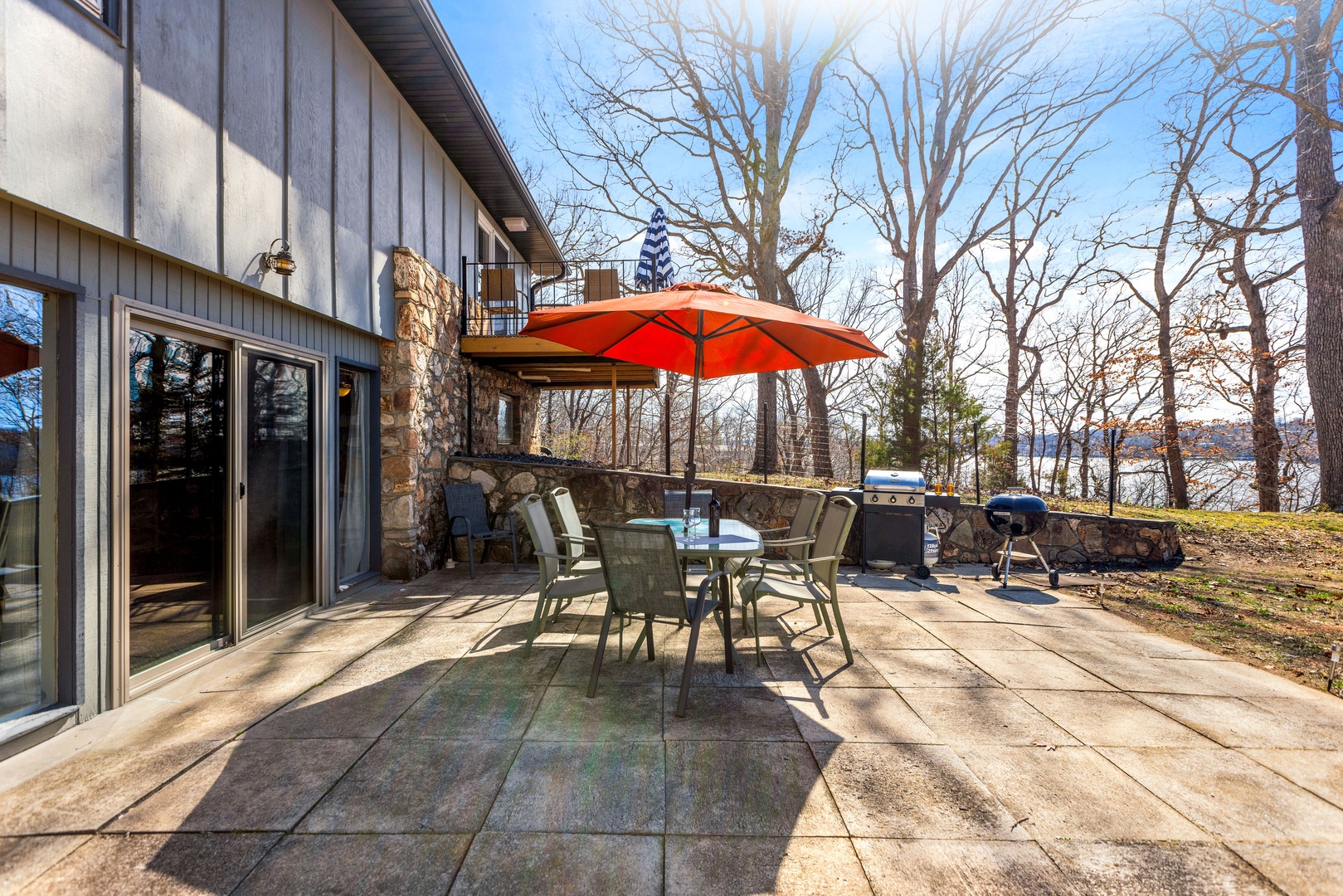 Outdoor patio with dual grills, ready for summer evening cookouts