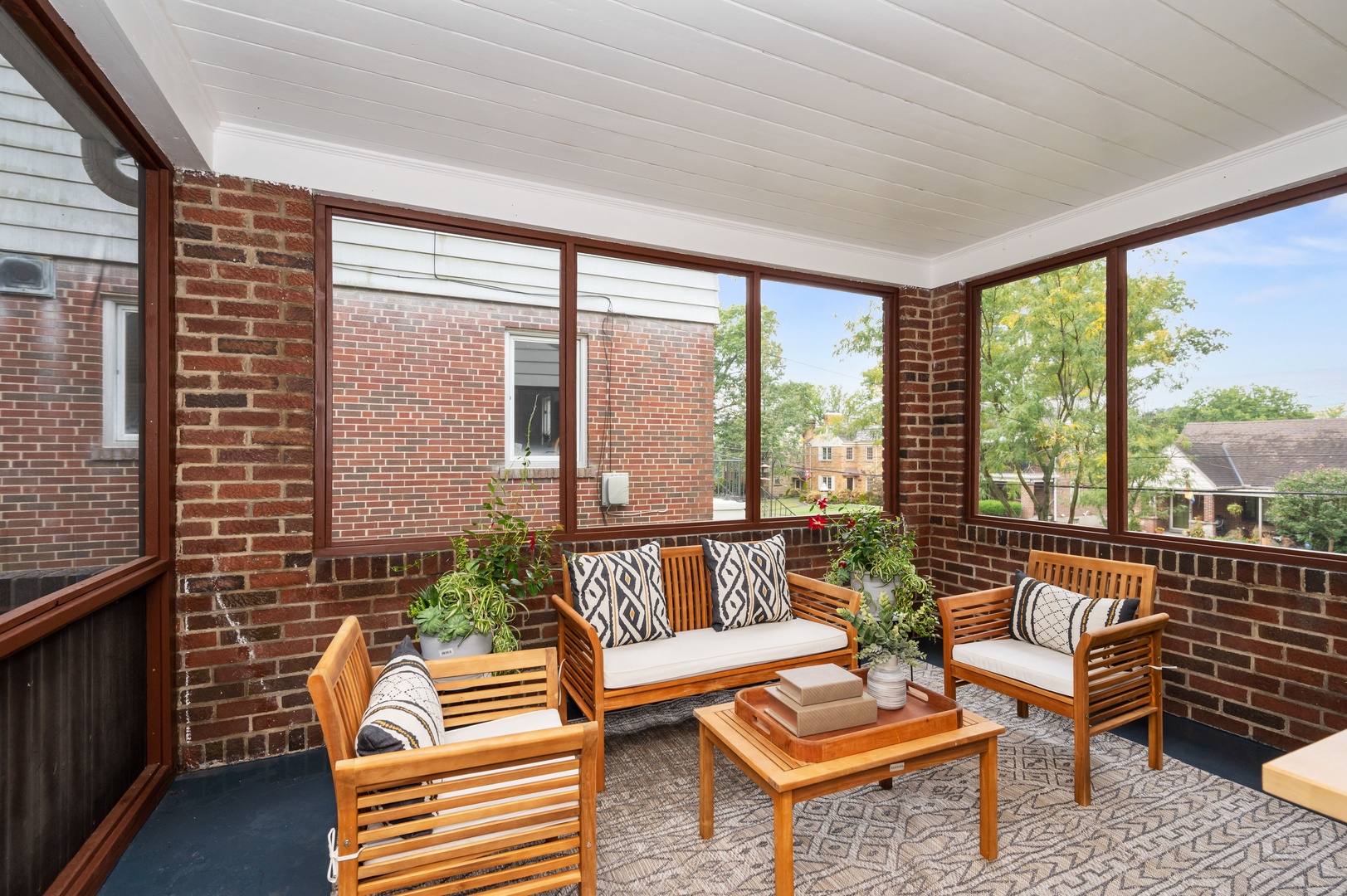 Lounge the day away in the fresh air on the enclosed porch