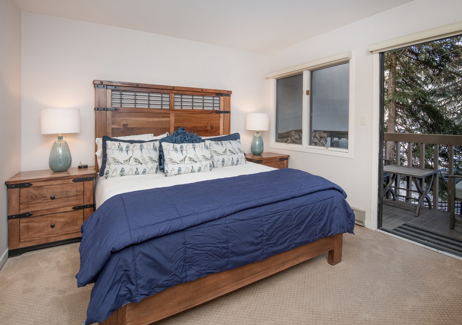 Bedroom with king bed, balcony, Smart TV, and ensuite