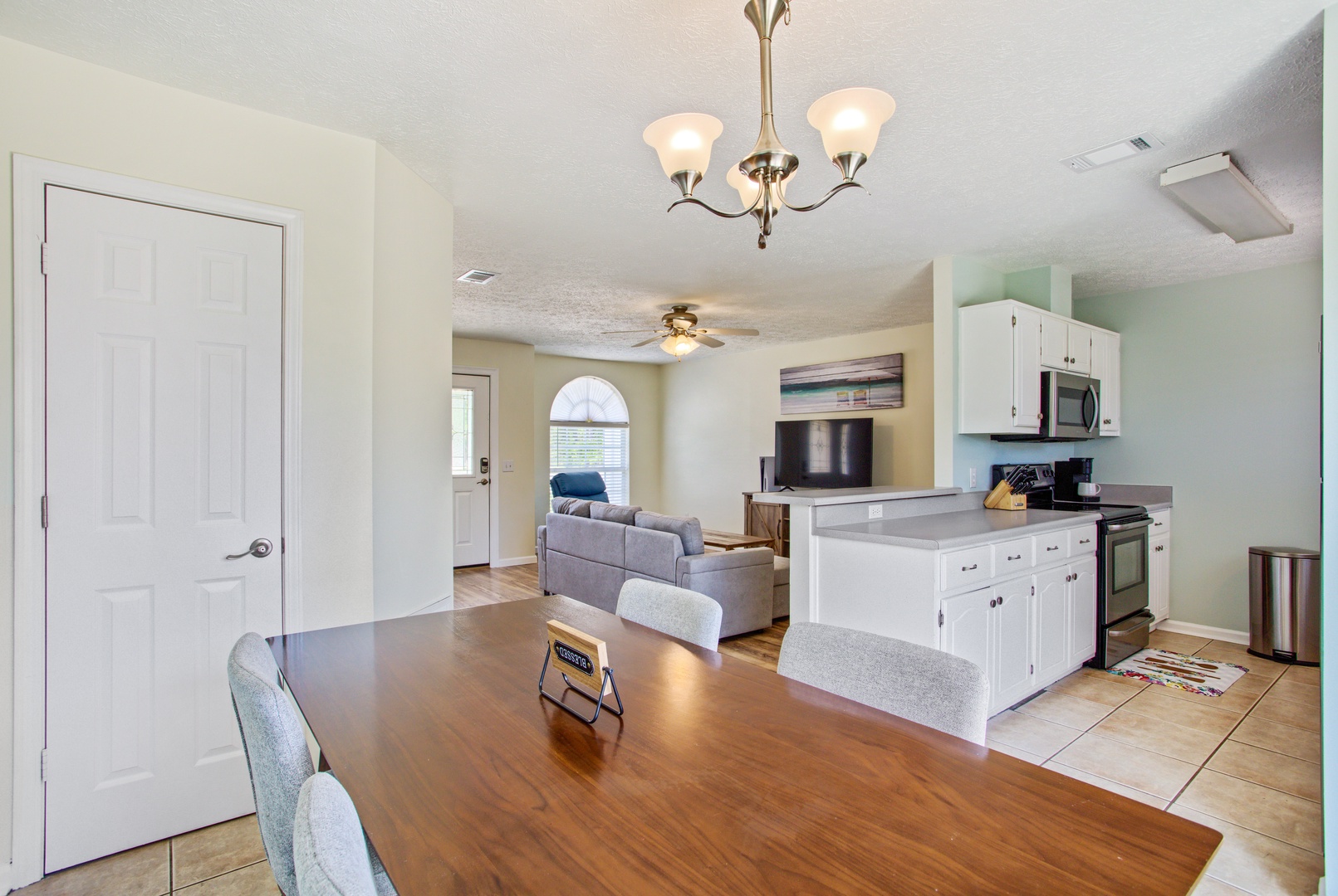 Dining, kitchen, and living area