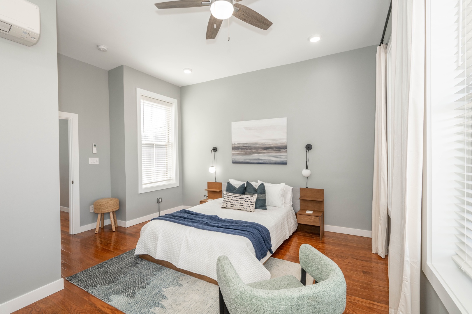 This serene queen suite features a private ensuite bath & Smart TV