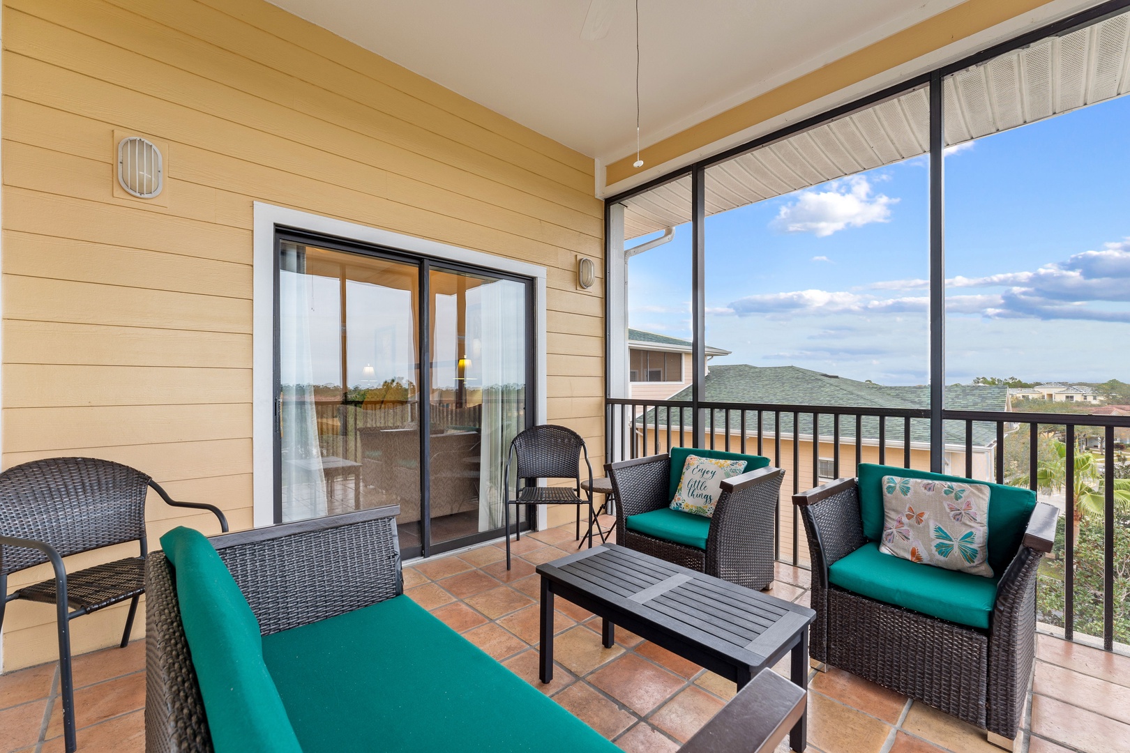 Enjoy morning coffee or dine alfresco on the breezy screened balcony