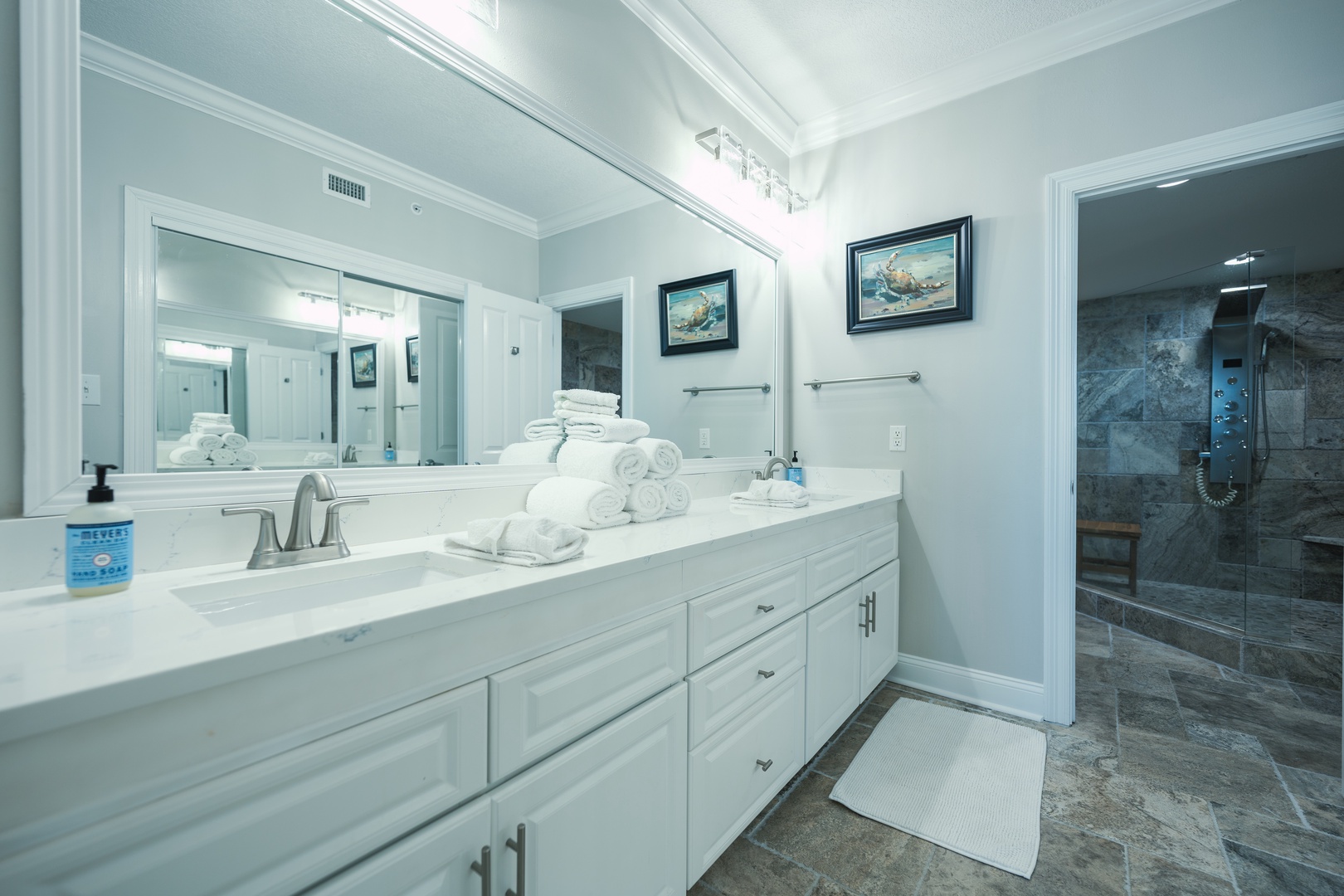 The king ensuite offers dual vanities & a luxurious glass shower