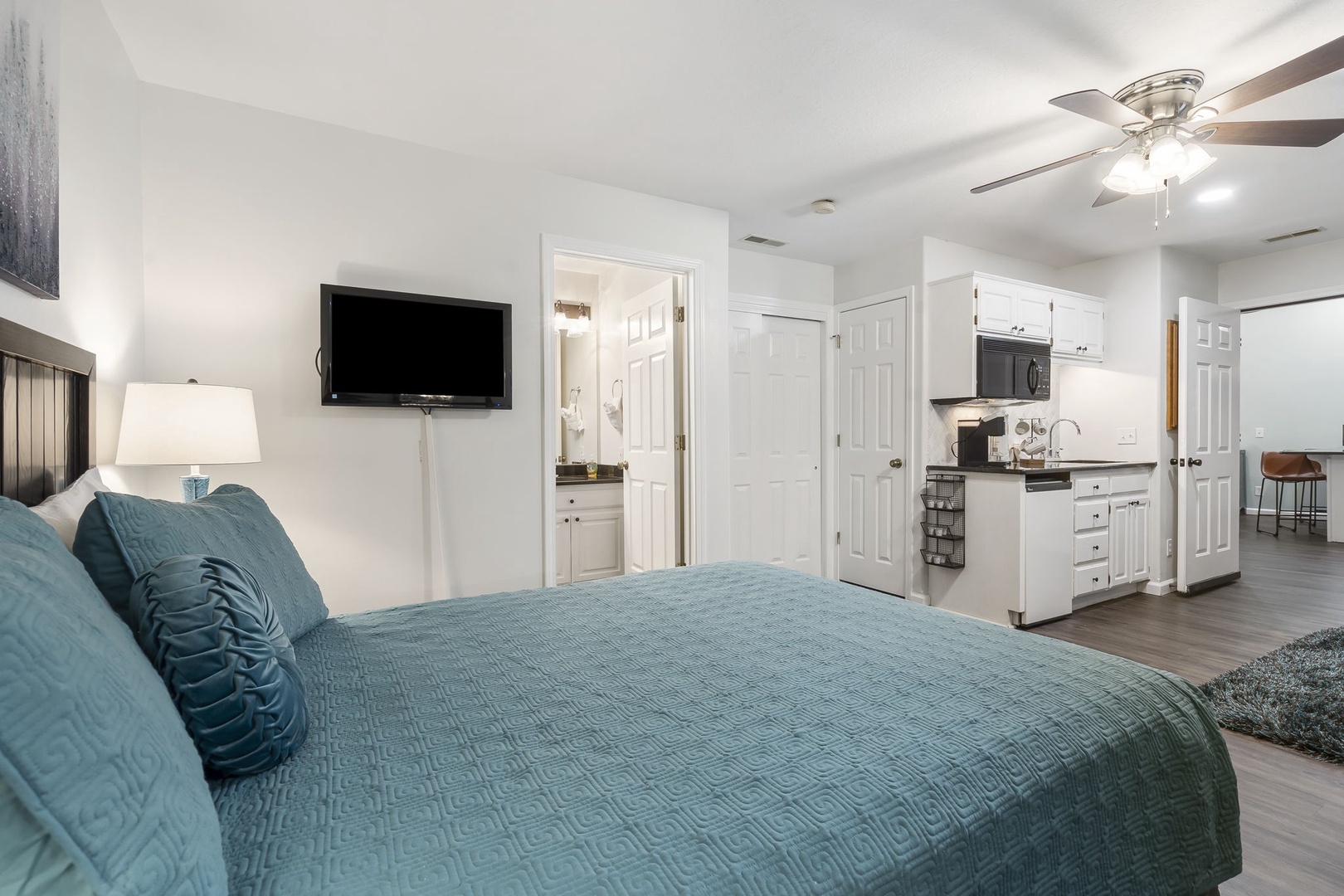 The private guest suite offers a kitchenette, Queen Bed, Bathroom, and Twin Sleeper Sofa