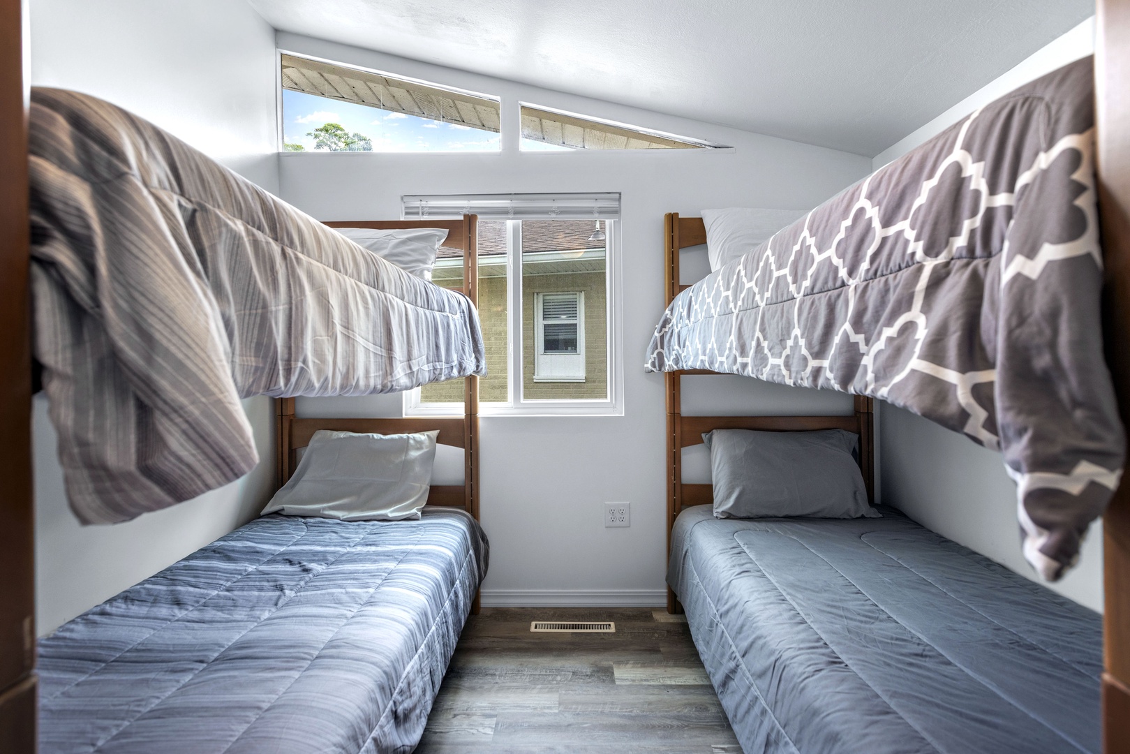 The second main-level bedroom offers two twin-over-twin bunks