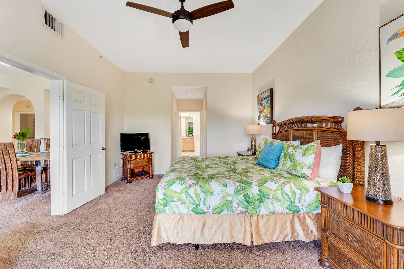 Bedroom 3 with king bed, TV, balcony, and ensuite