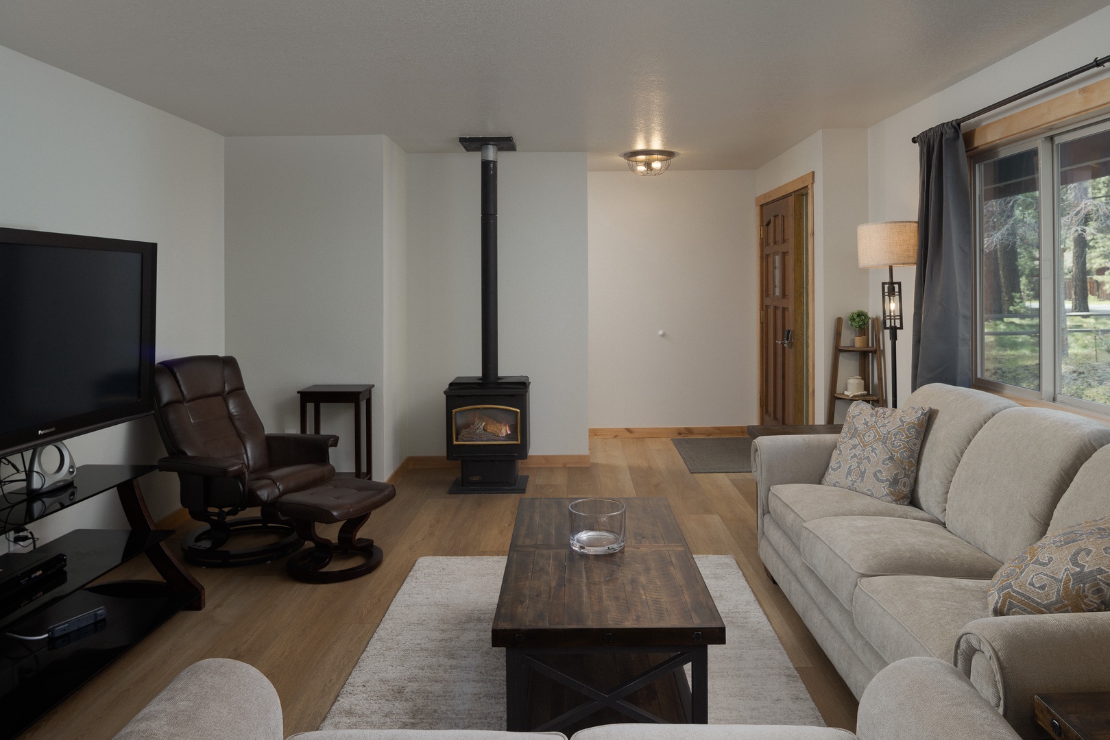 Cozy up in our living room retreat, complete with plush seating and a Smart TV