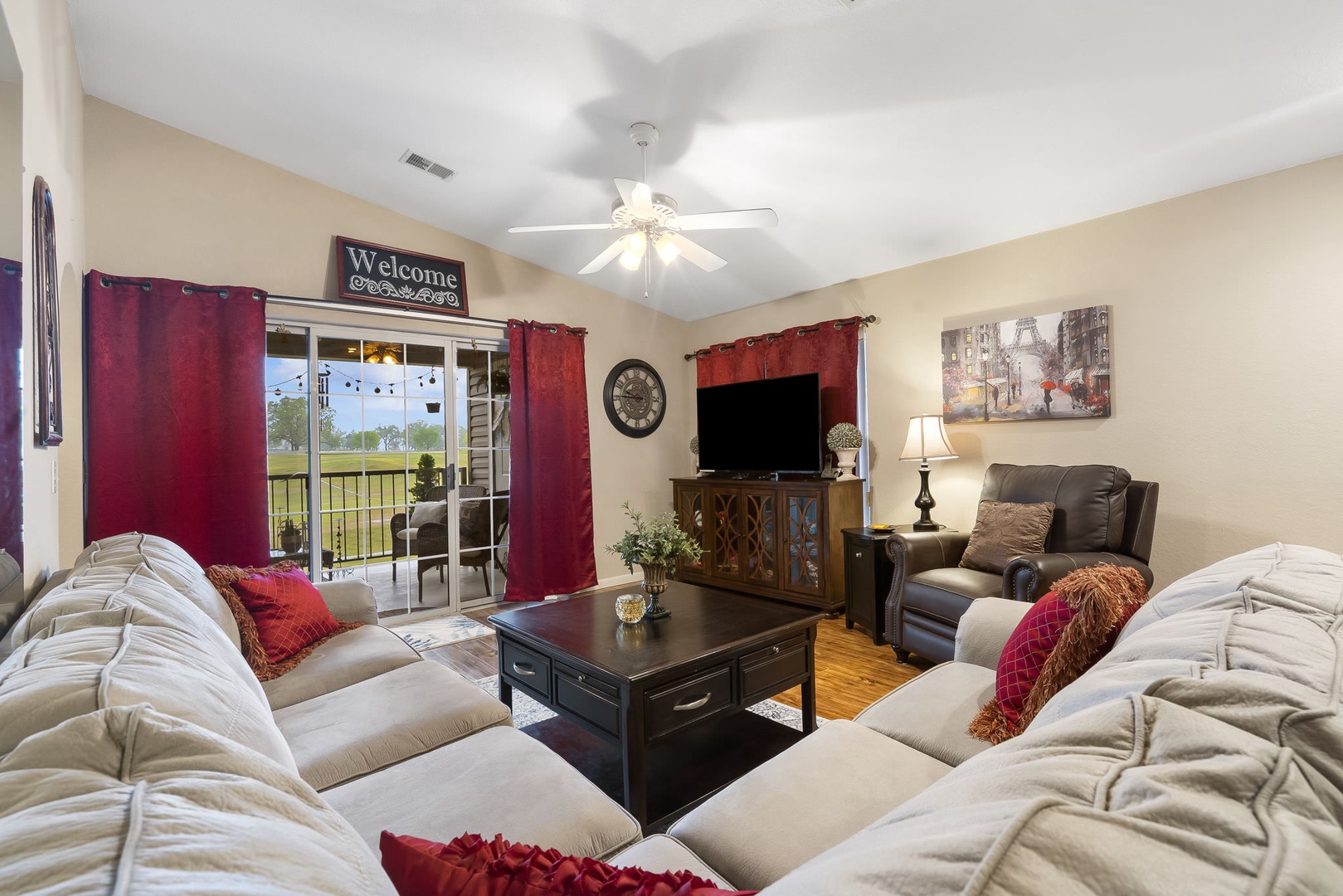 Cozy and spacious living area with TV