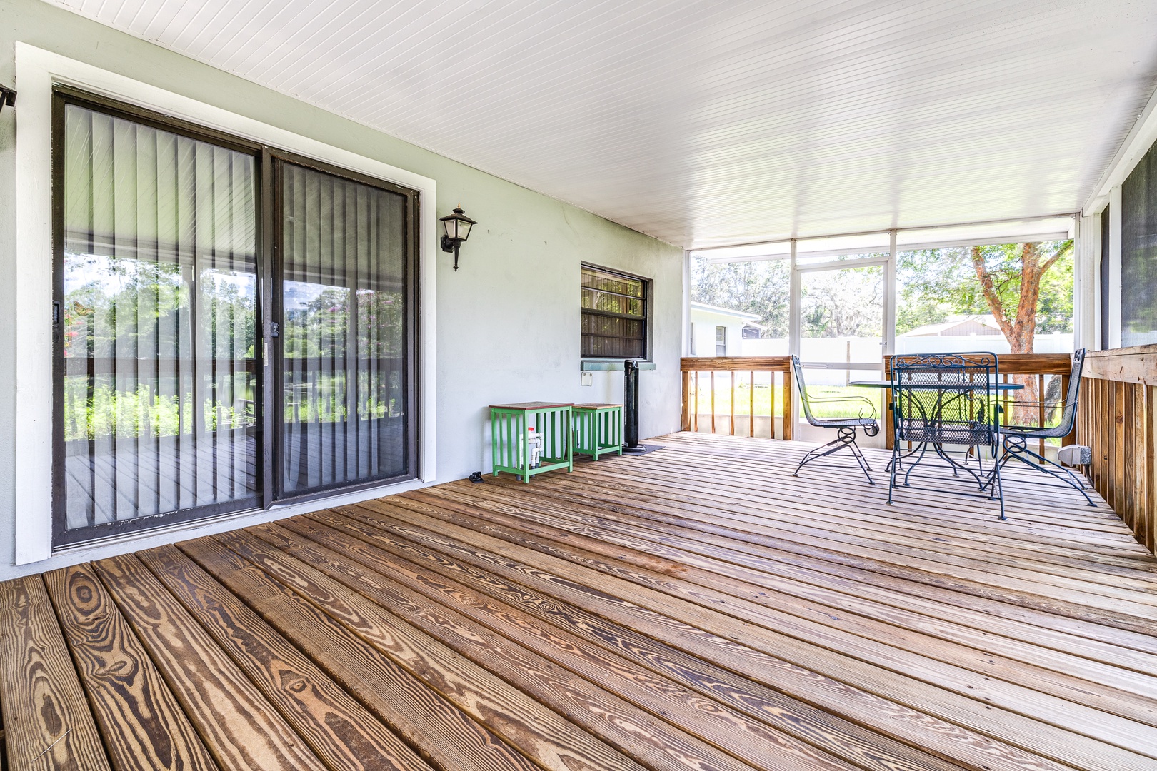 Lounge the day away in the fresh air on the screened porch!