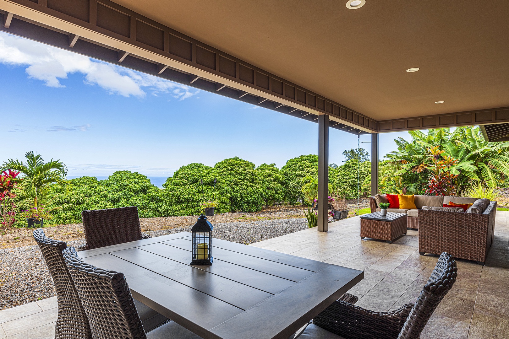 Lanai with patio furniture and ocean view