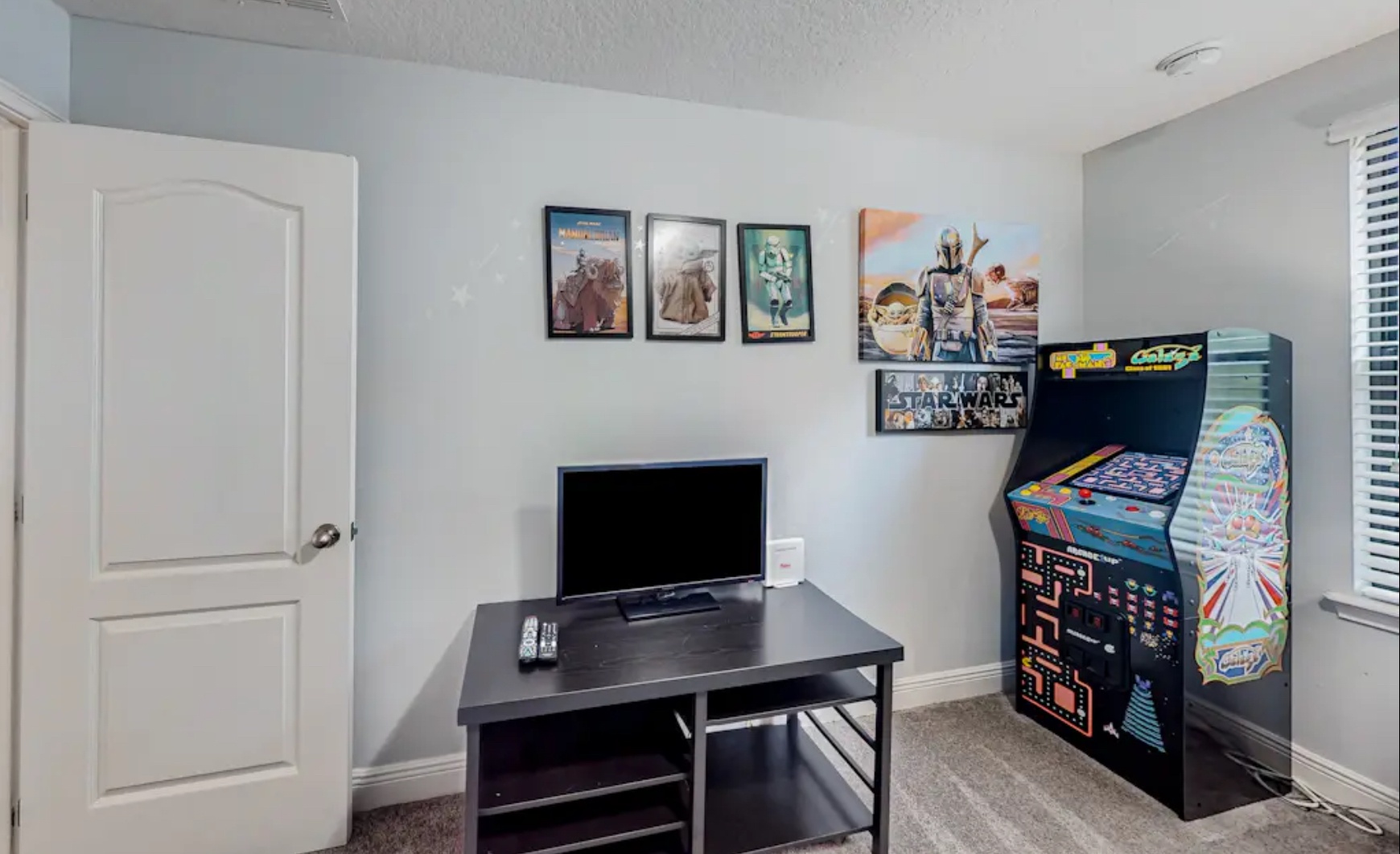 The 3rd bedroom in a galaxy far, far away: with twin/full bunks, arcade game, & TV