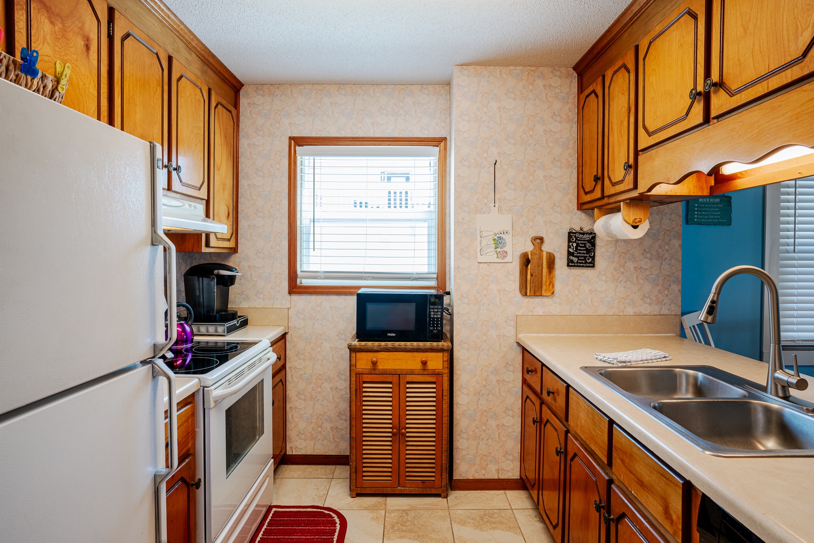 An open, airy kitchen equipped with all the comforts of home