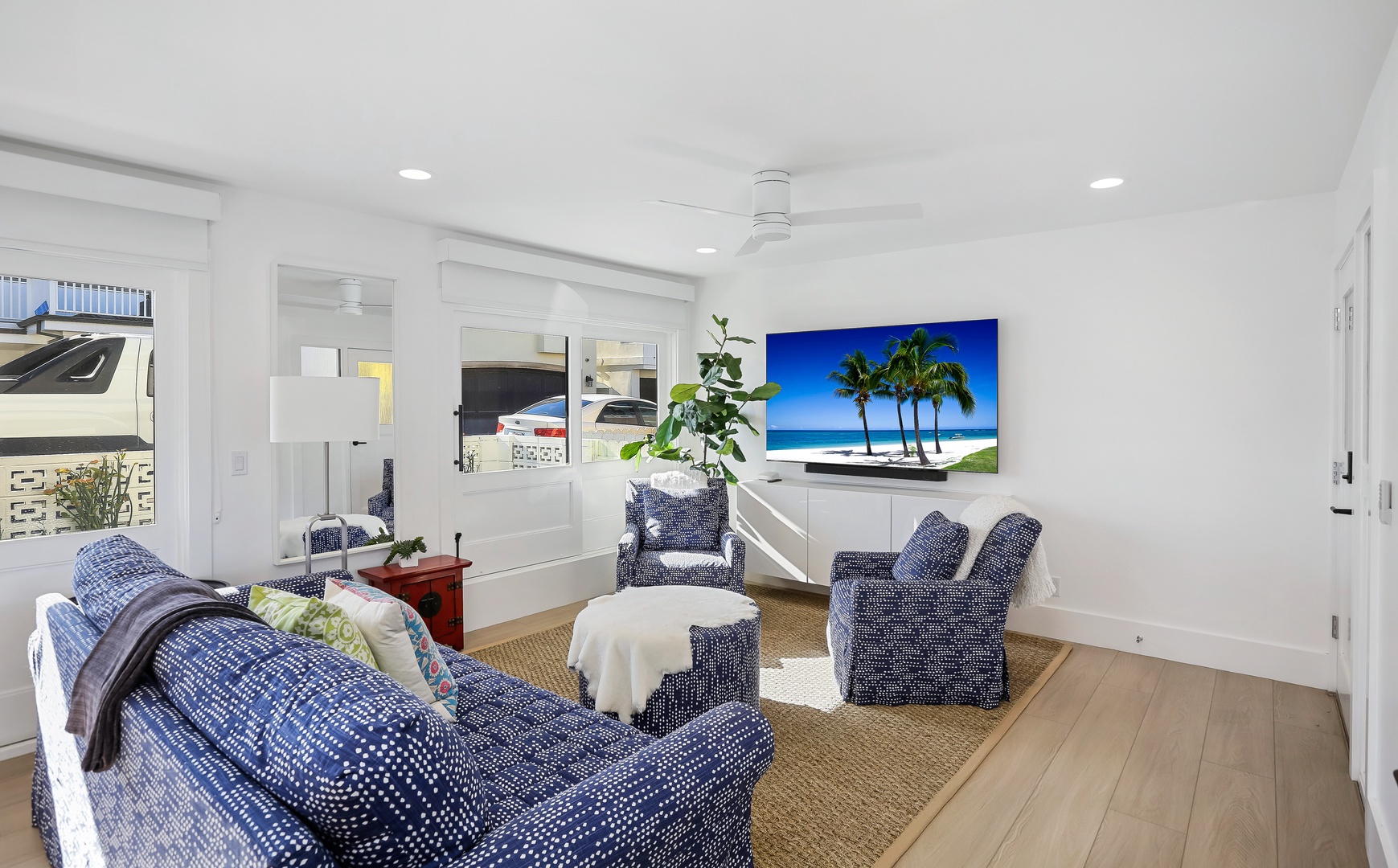 Cozy and spacious living area with TV
