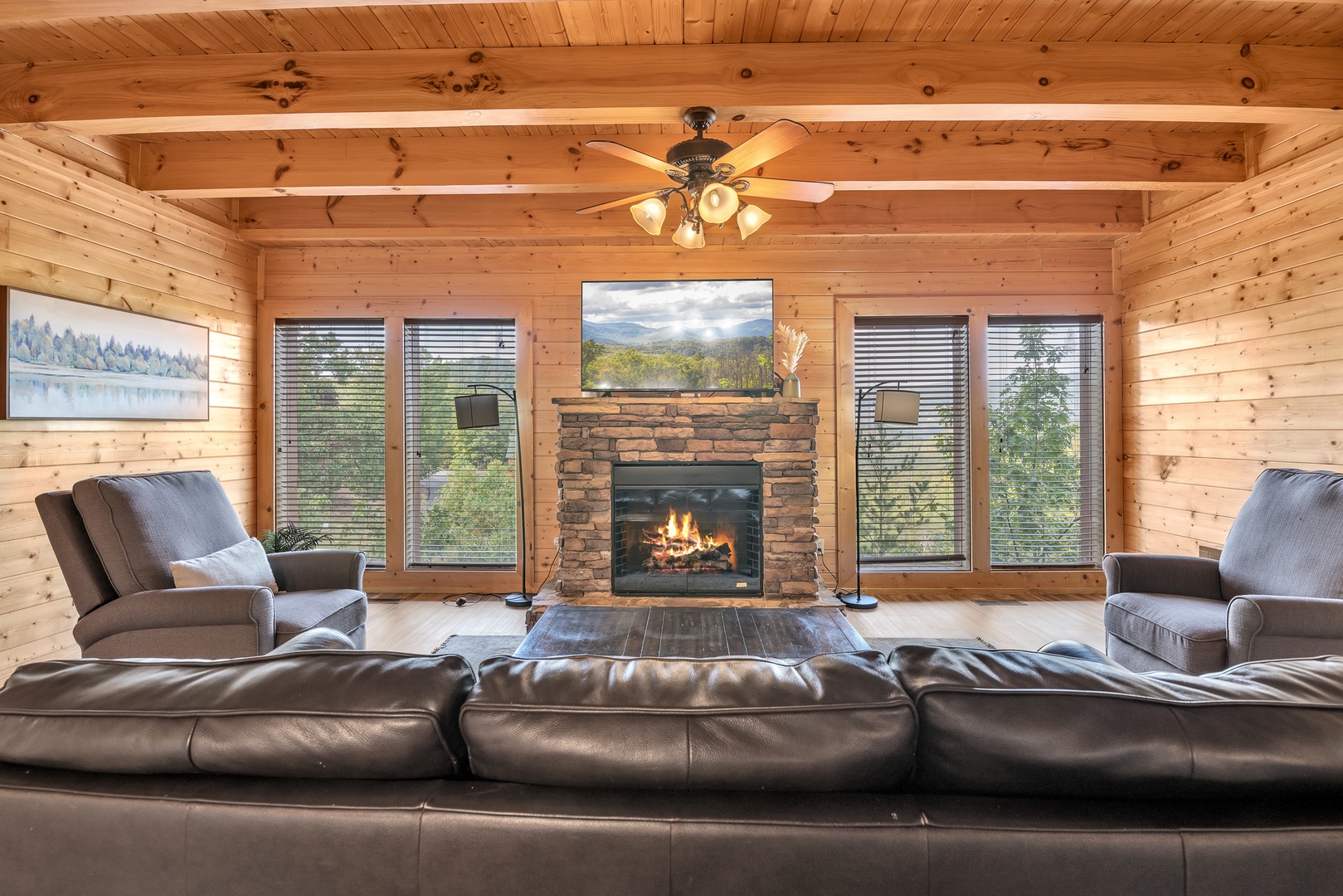 Curl up in the spacious living room & enjoy a movie by the fireplace
