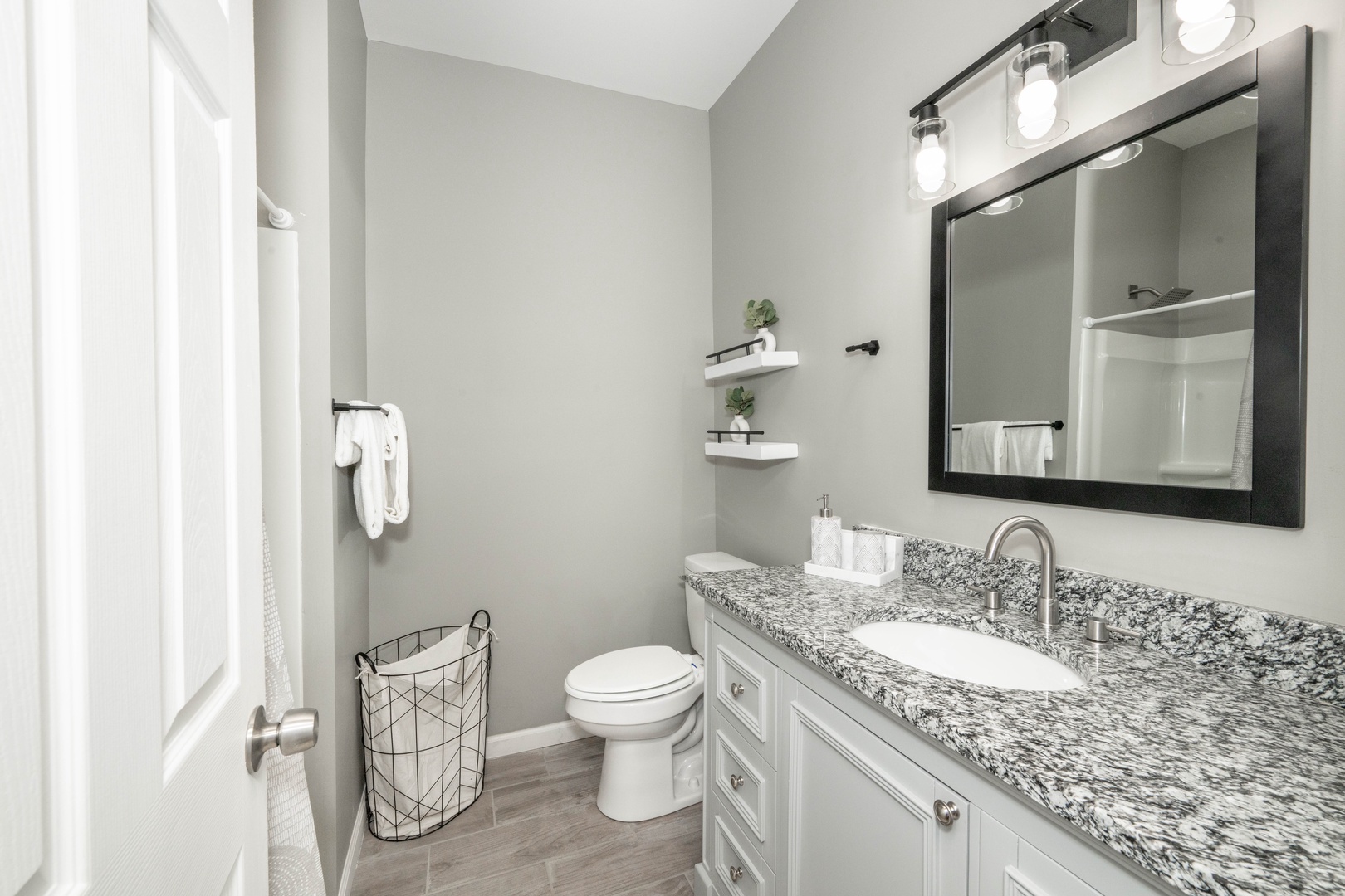The 2nd floor full bath offers a spacious single vanity & shower/tub combo