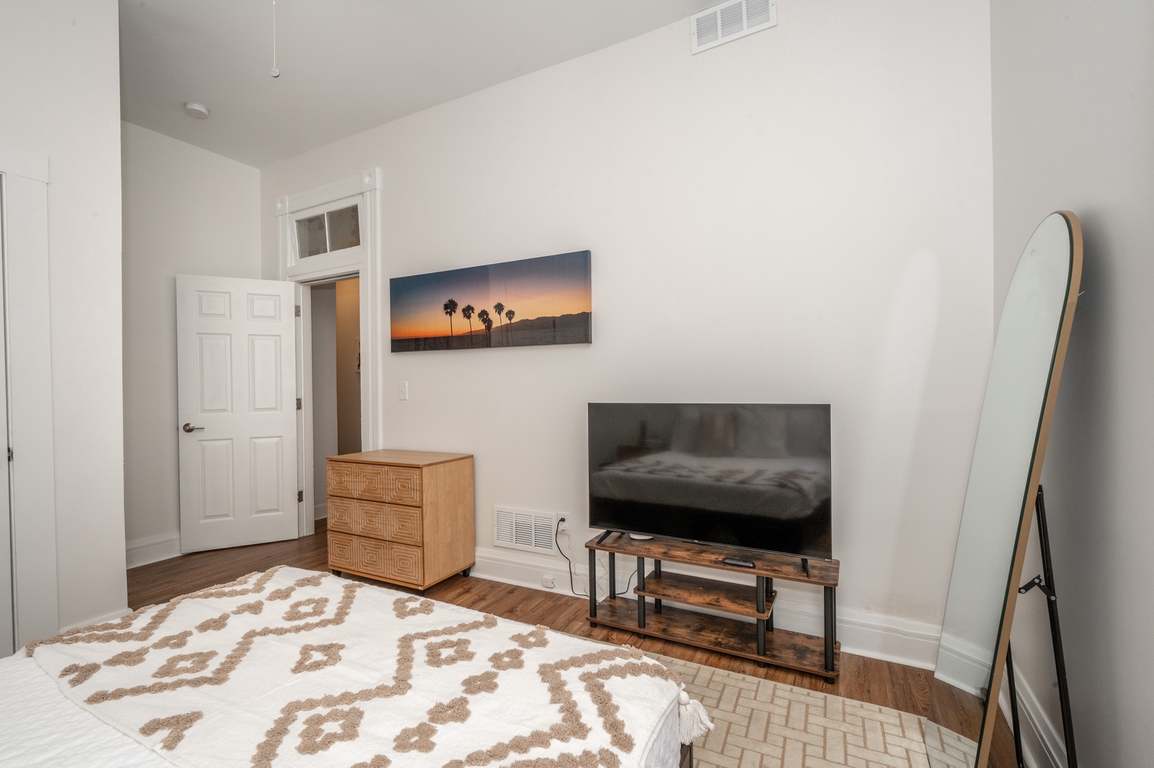 Unit 3: The 2nd of 2 queen bedrooms offers a Smart TV & ceiling fan