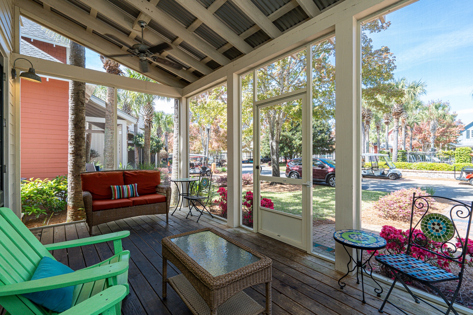 Screened in porch with outdoor seating