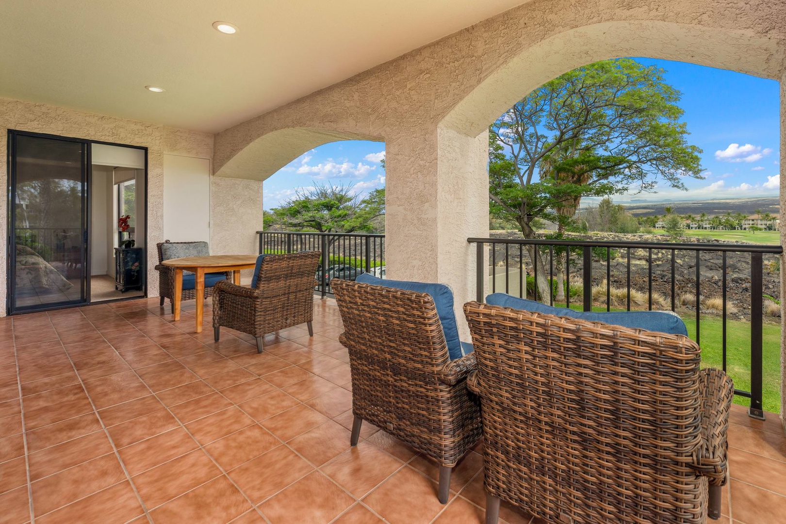 Lanai with seating and golf course views