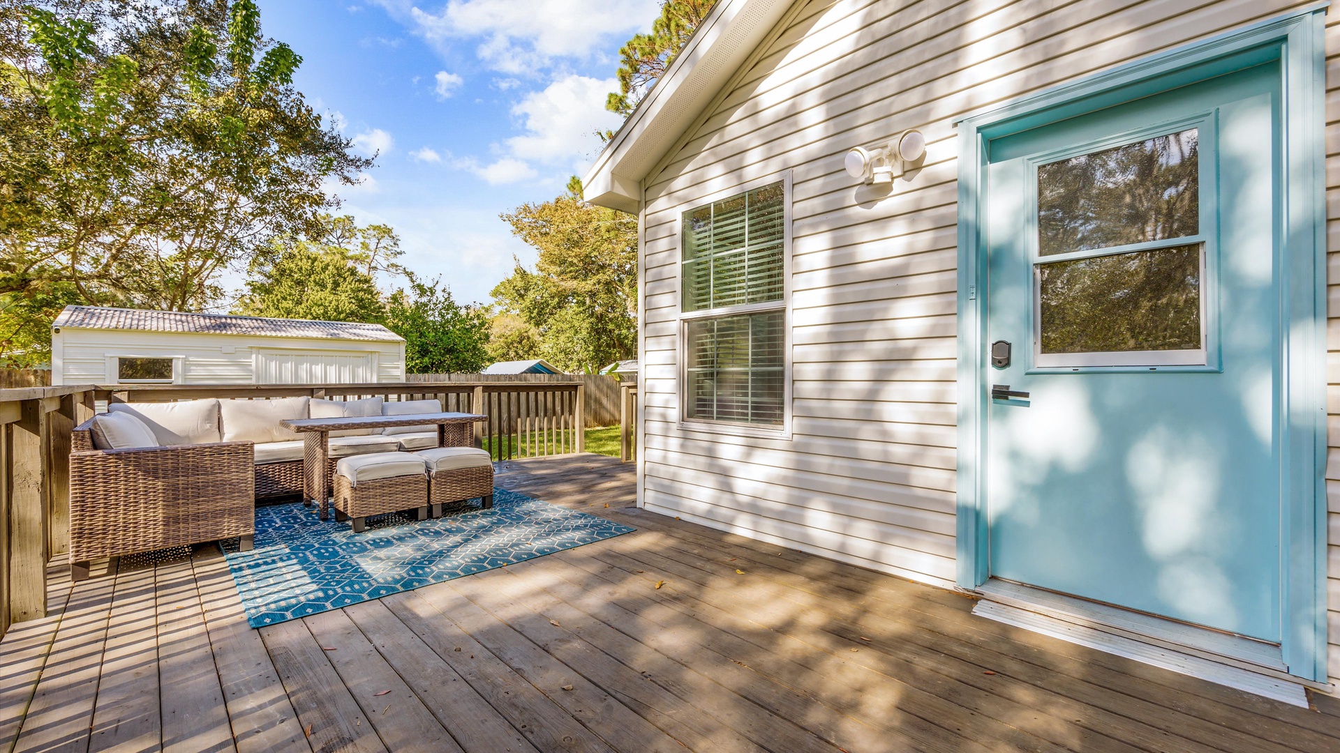 Step out onto the sunny back deck & lounge the day away in the fresh air