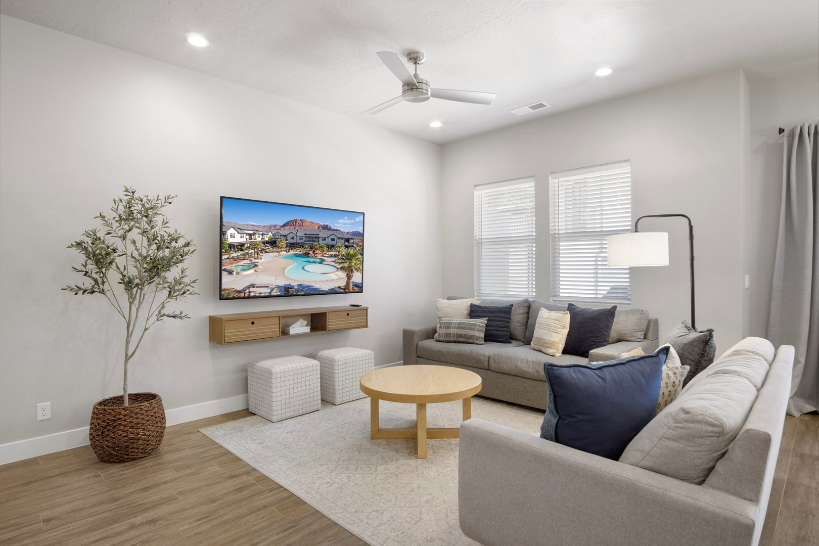 Ample seating for family and friends in the living area with TV