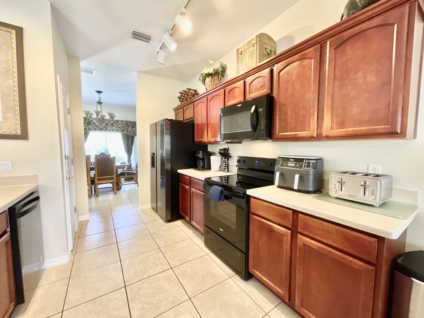 The kitchen offers ample storage space & all the comforts of home