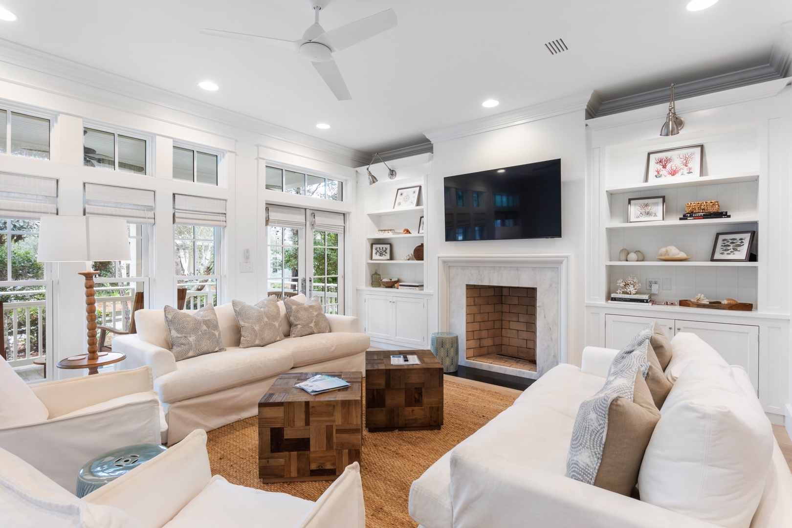 Modern spacious living area with TV