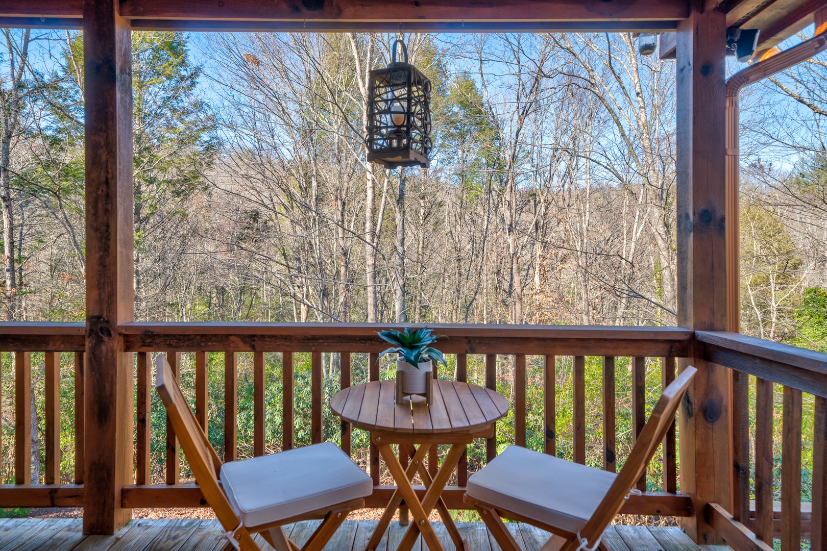 Savor the crisp breeze on the porch with comfortable outdoor seating