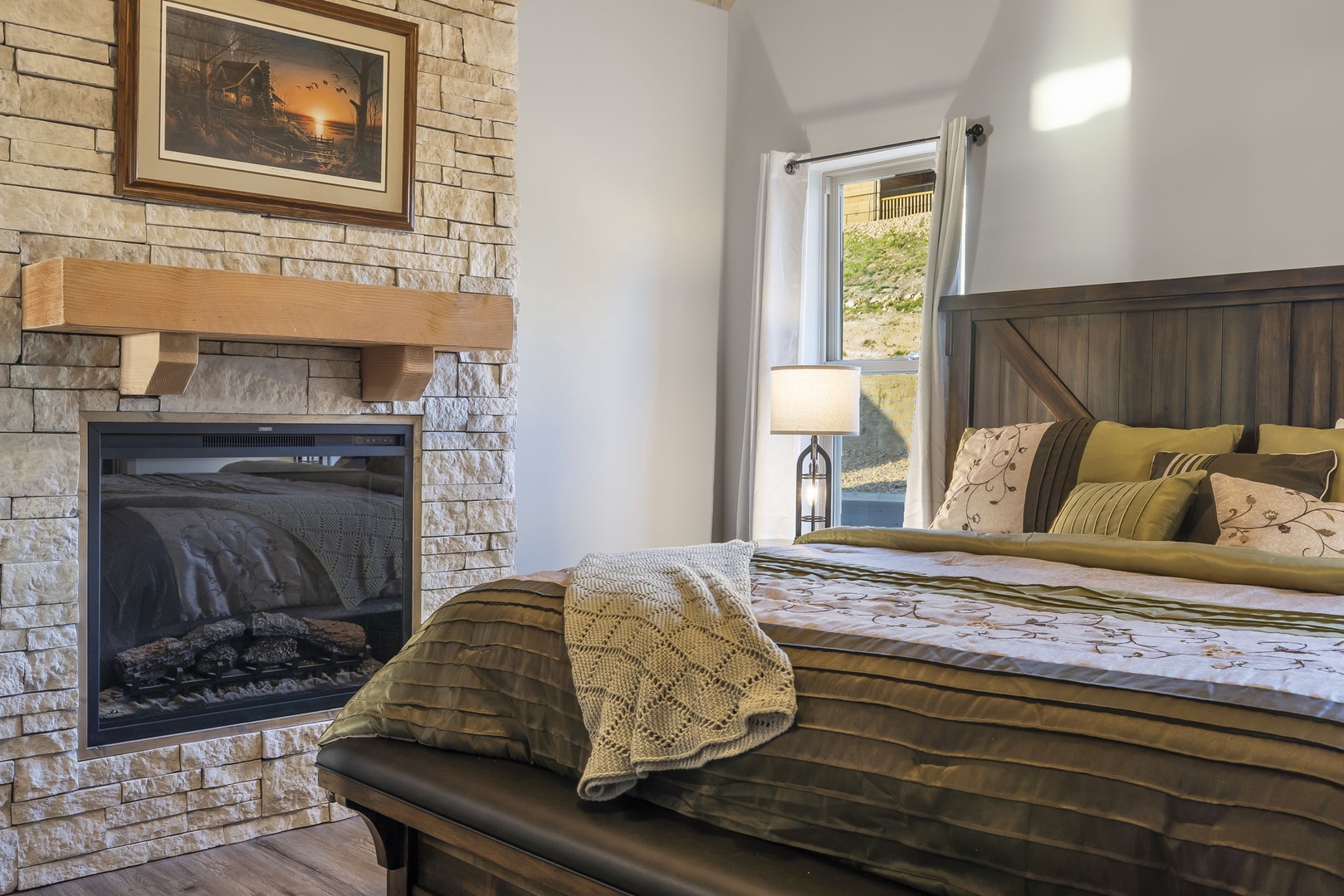 This inviting king suite boasts a private ensuite, Smart TV, & fireplace