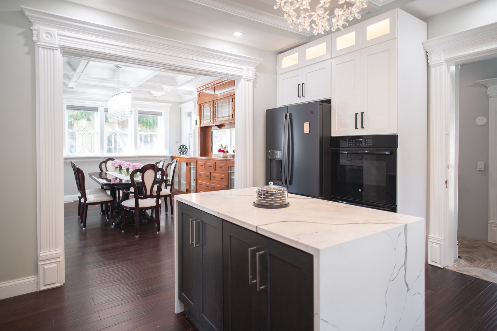 Enjoy the open flow between the main house’s kitchen & formal dining room