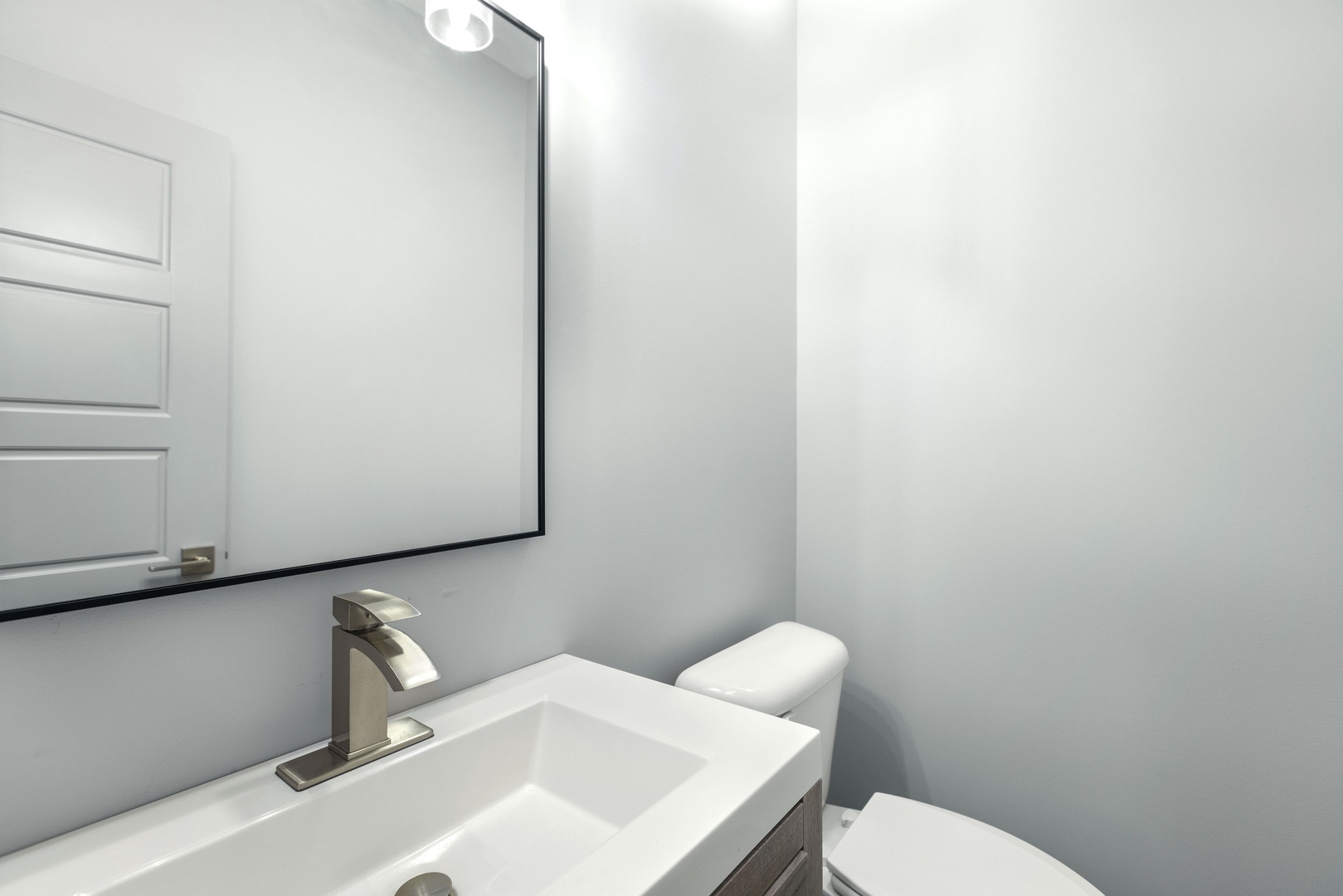 The half bath includes a single vanity