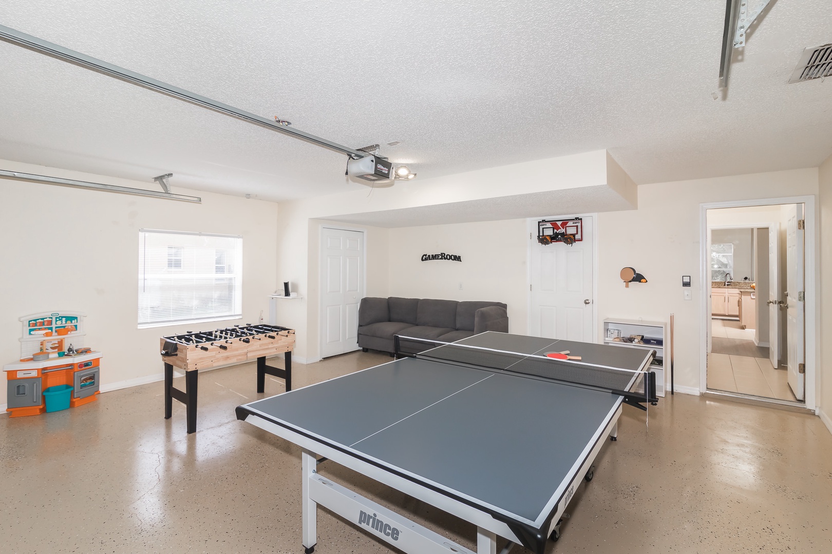 Game  room in garage with ping pong, foosball, board games & more!
