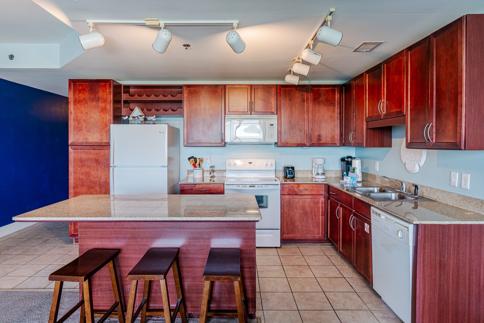 Sip morning coffee or enjoy a meal at the kitchen counter, with seating for 3