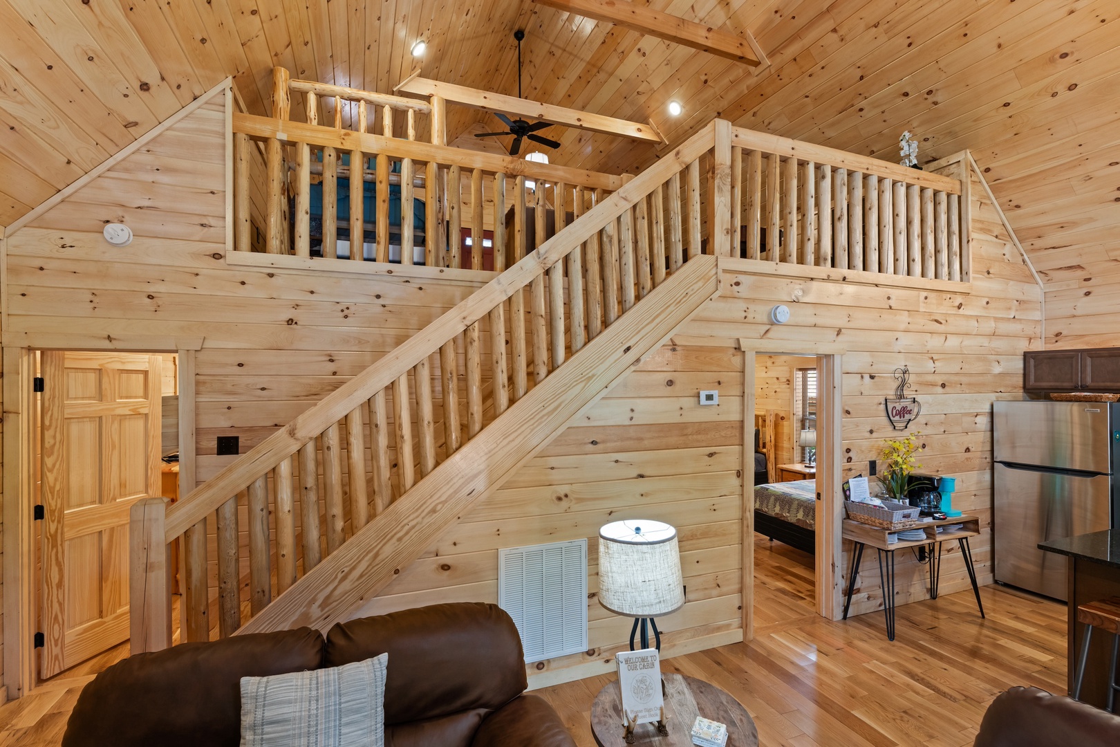 Game & relax in the loft, offering a futon & twin bed/trundle combo