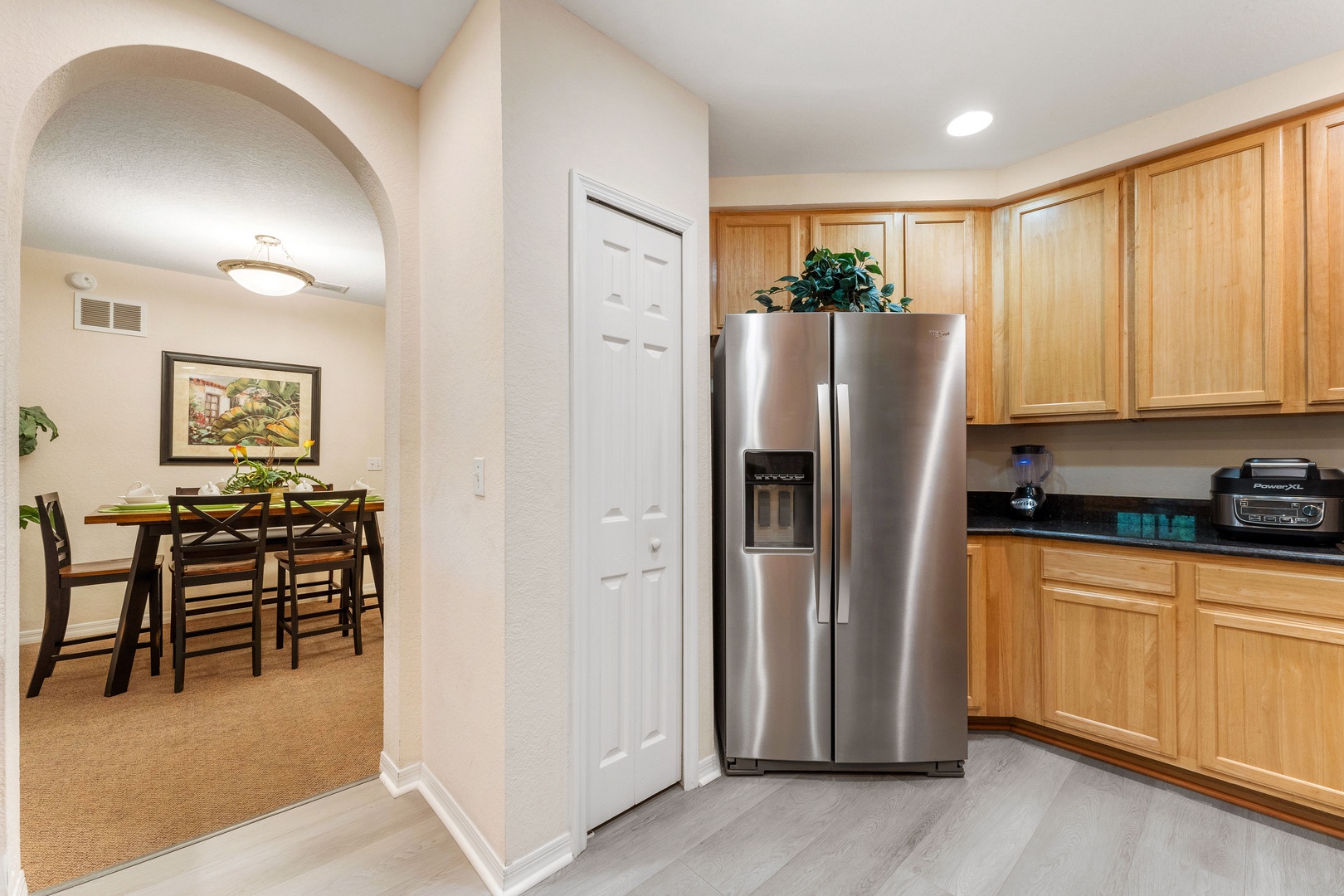 The open, airy kitchen offers ample space & all the comforts of home