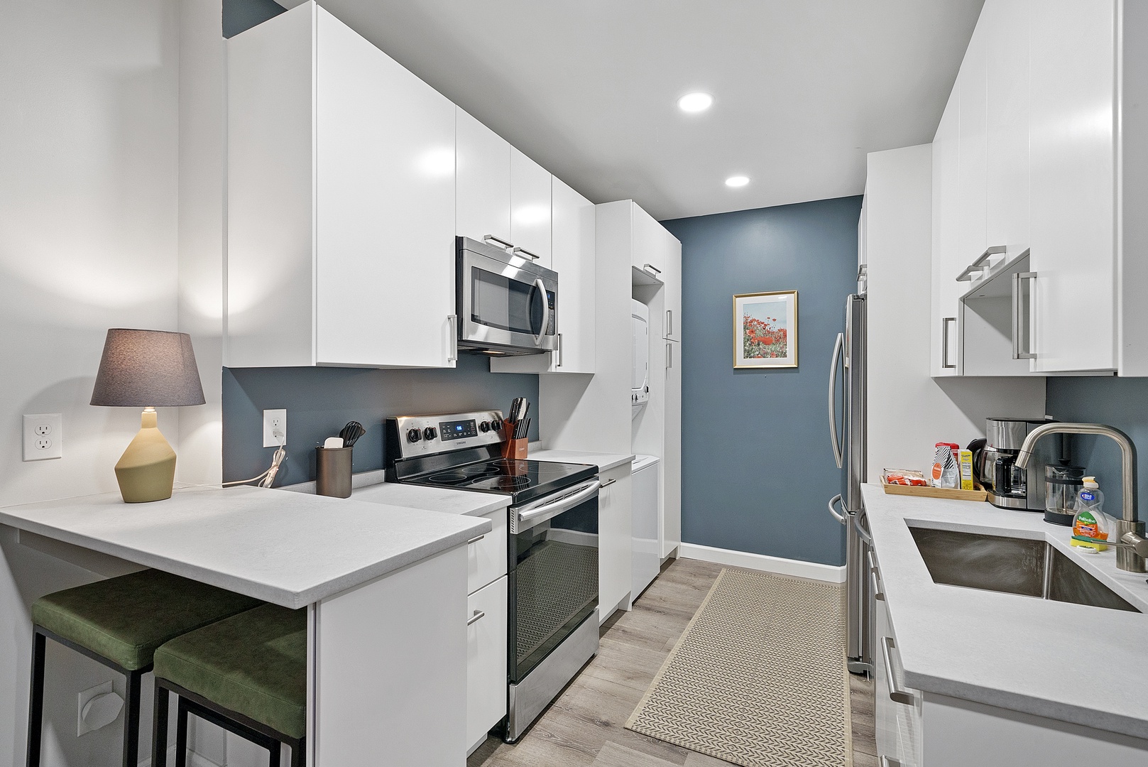 The updated kitchen offers ample space & every home comfort