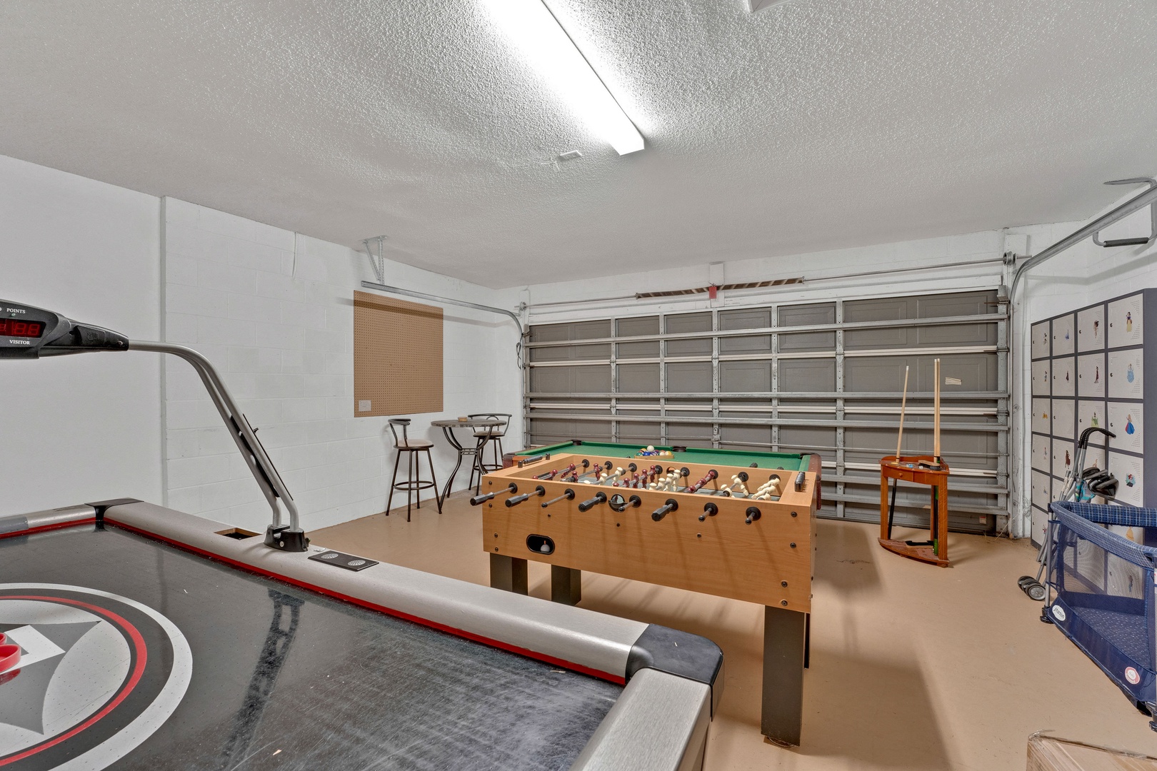 Game room featuring pool, foosball, and air hockey tables