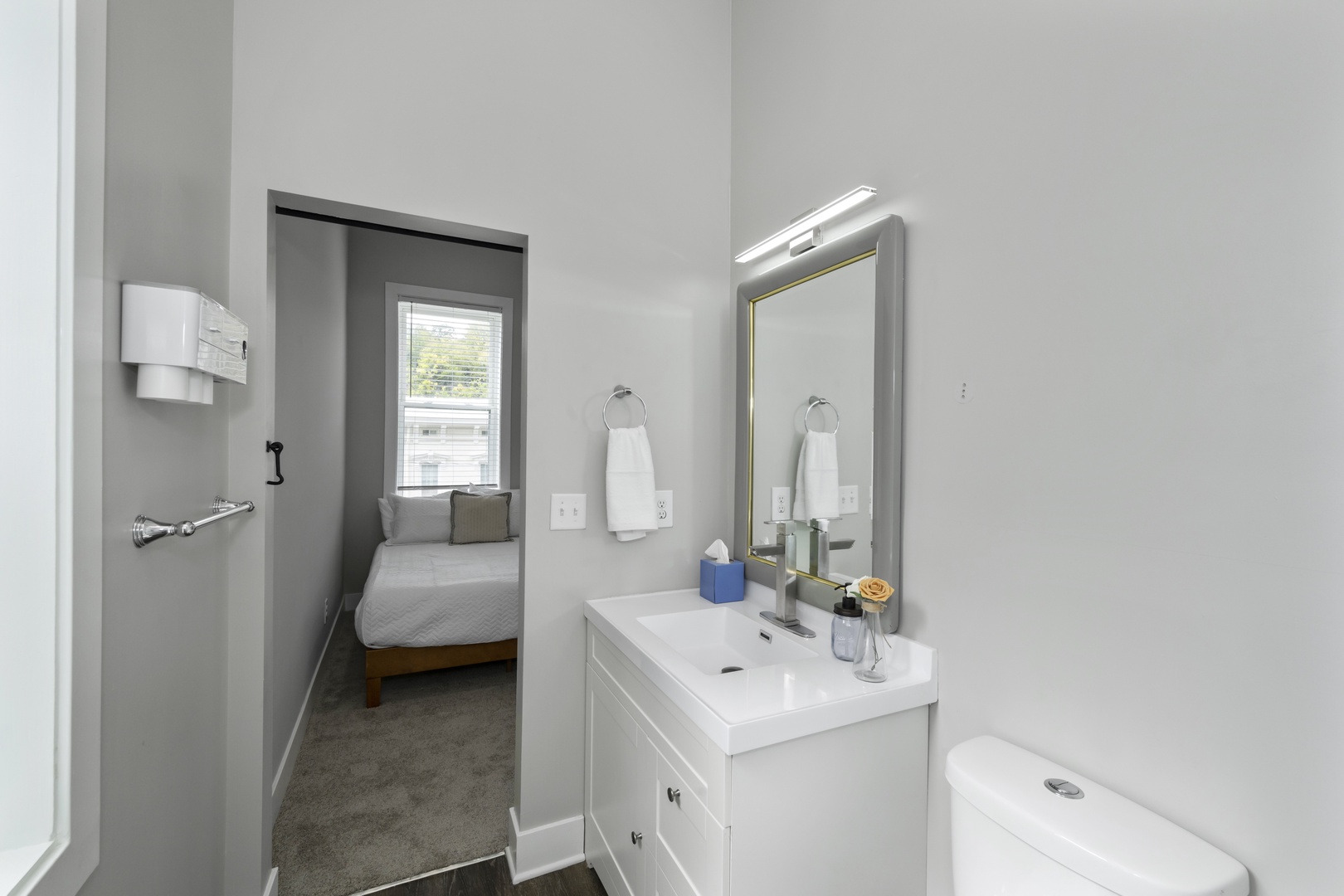The 2nd bedroom en suite bath offers a single vanity & glass shower