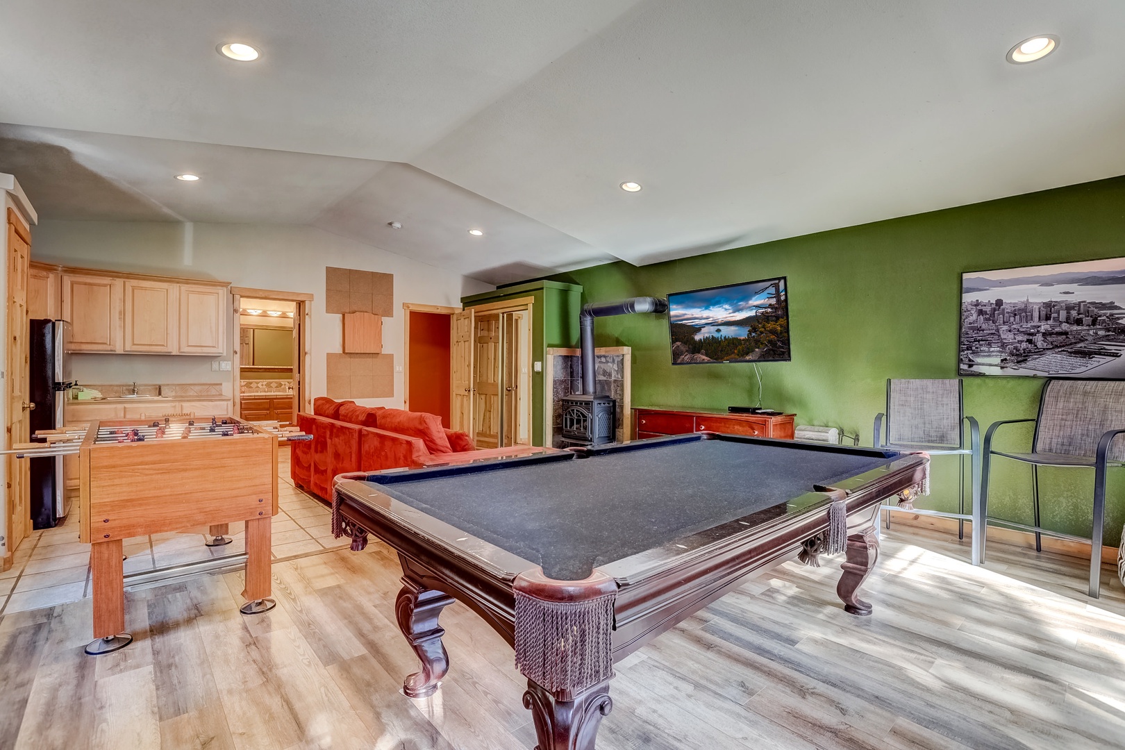 Game room with pool table, foosball table, dart board, cable TV