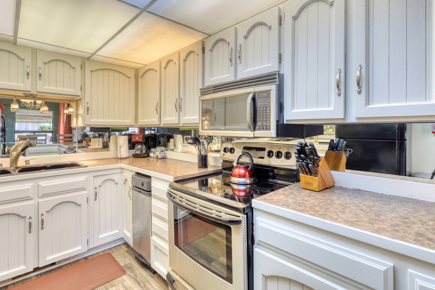 Electric range, microwave and trash compactor