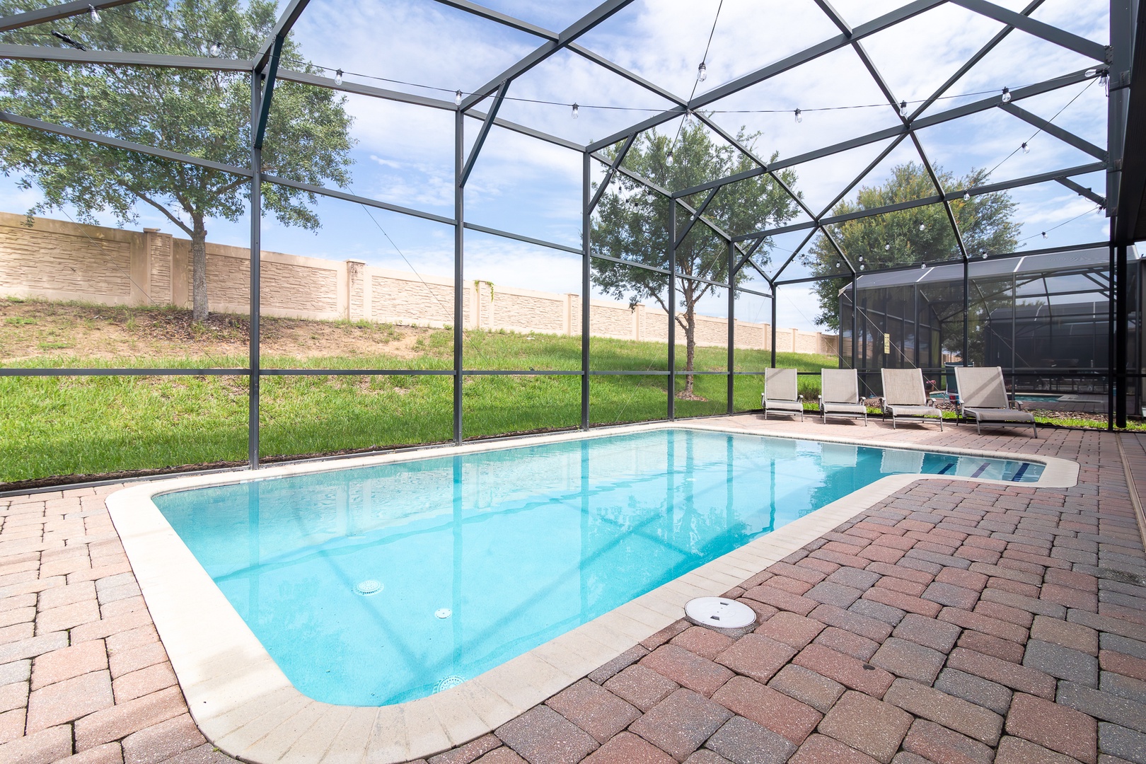 Lounge the day away or make a splash in the pool under the lanai