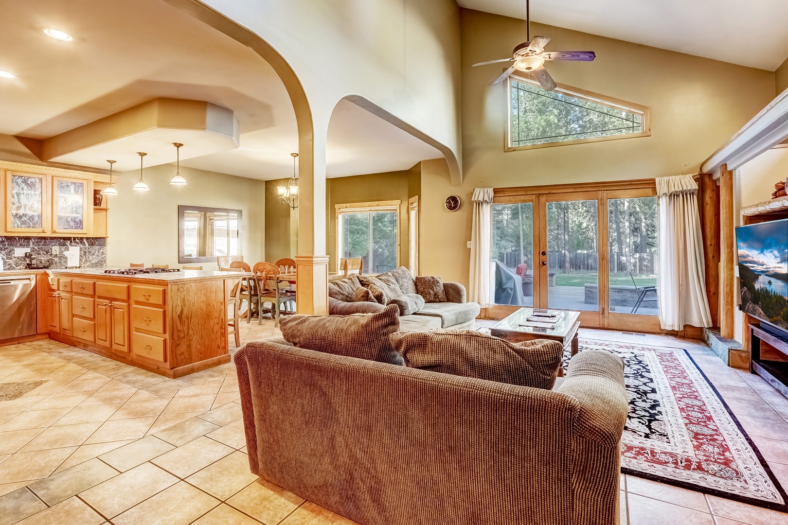 Living room with gas fireplace, Smart TV, and comfortable seating