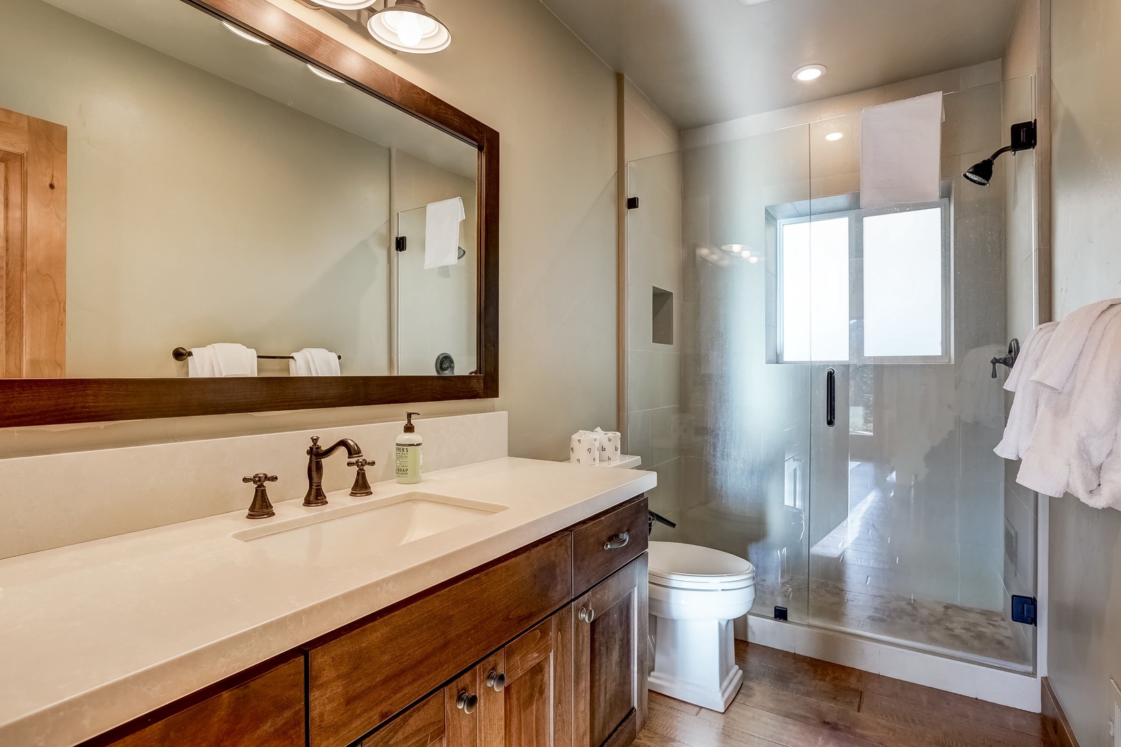Shared bathroom with standing shower on main floor