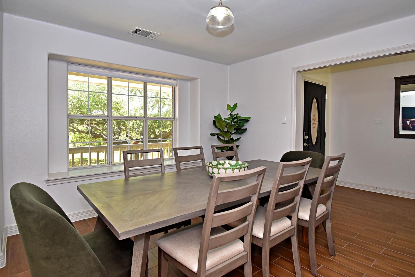 Gather for elegant meals together at the dining table, with seating for 8