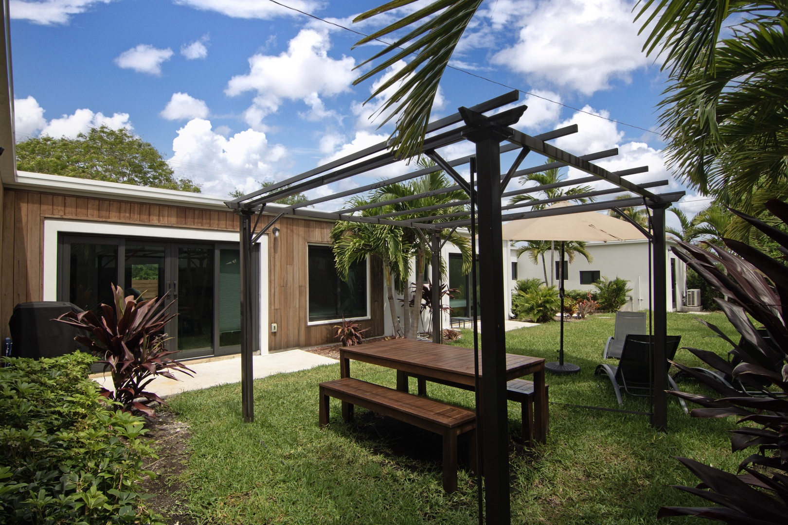Relish in the tranquility of our secluded backyard retreat