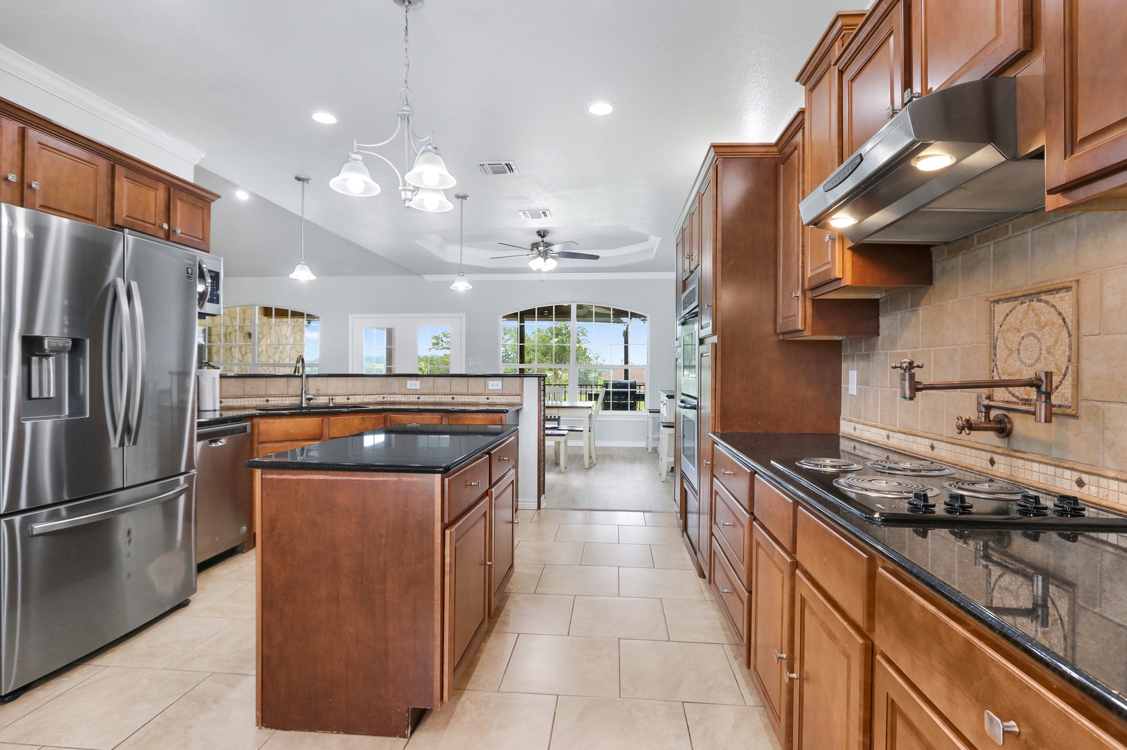 The warm, inviting kitchen offers ample space & all the comforts of home