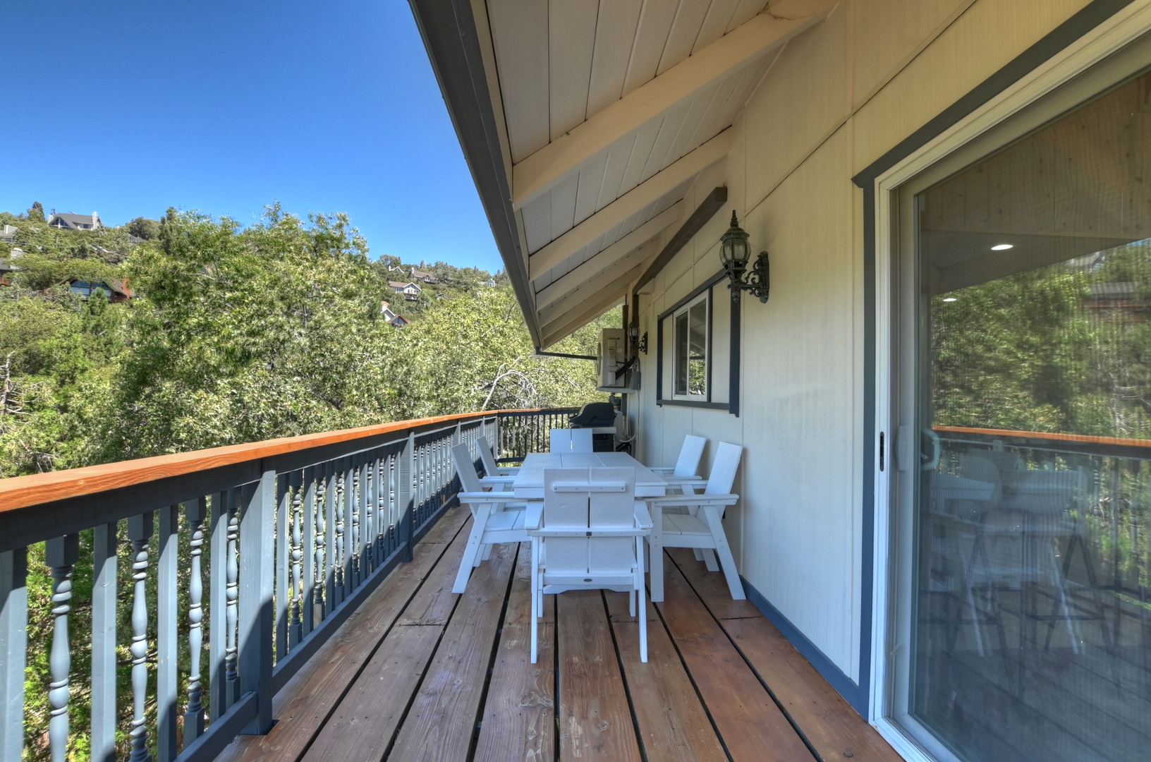 Deck with outdoor seating and grill