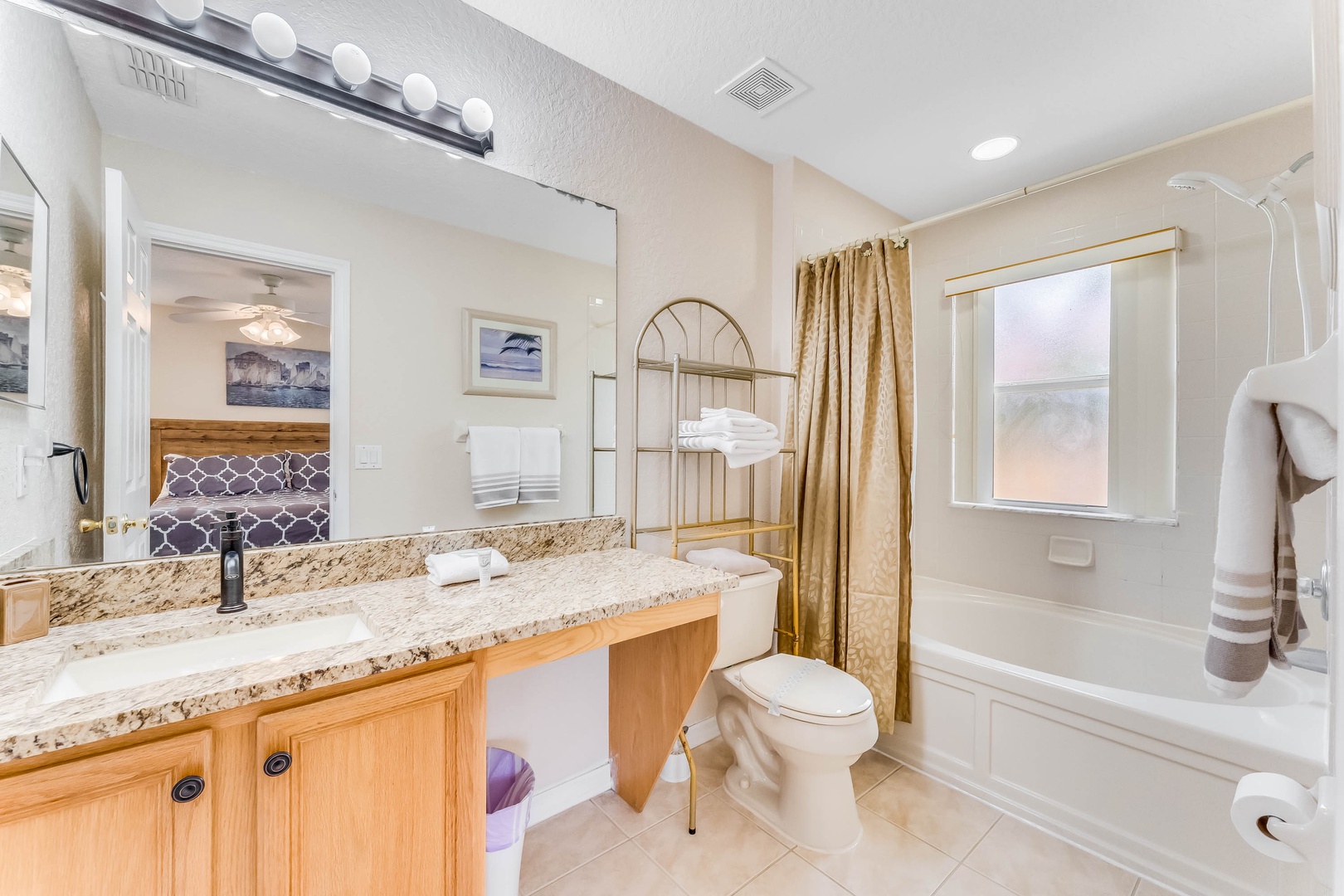 The 2nd floor king en suite with an oversized vanity and shower/soaking tub combo