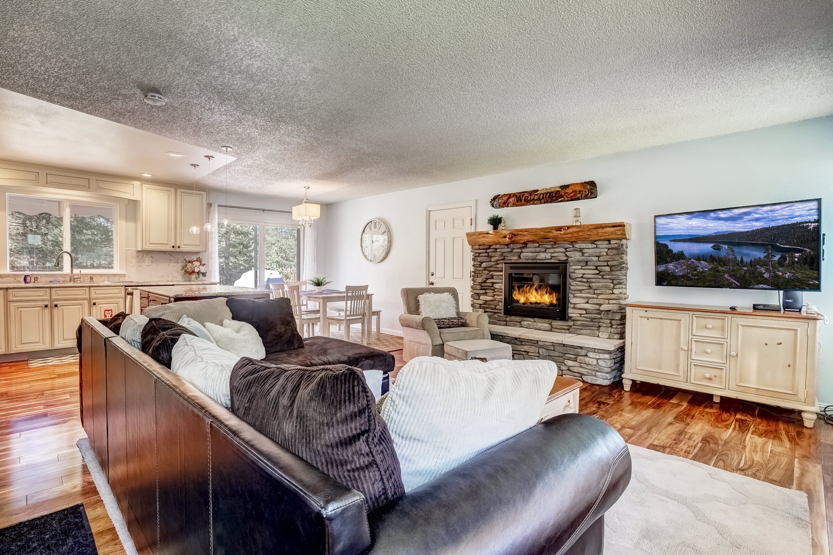 Living room with Smart TV, gas fireplace, and comfortable seating